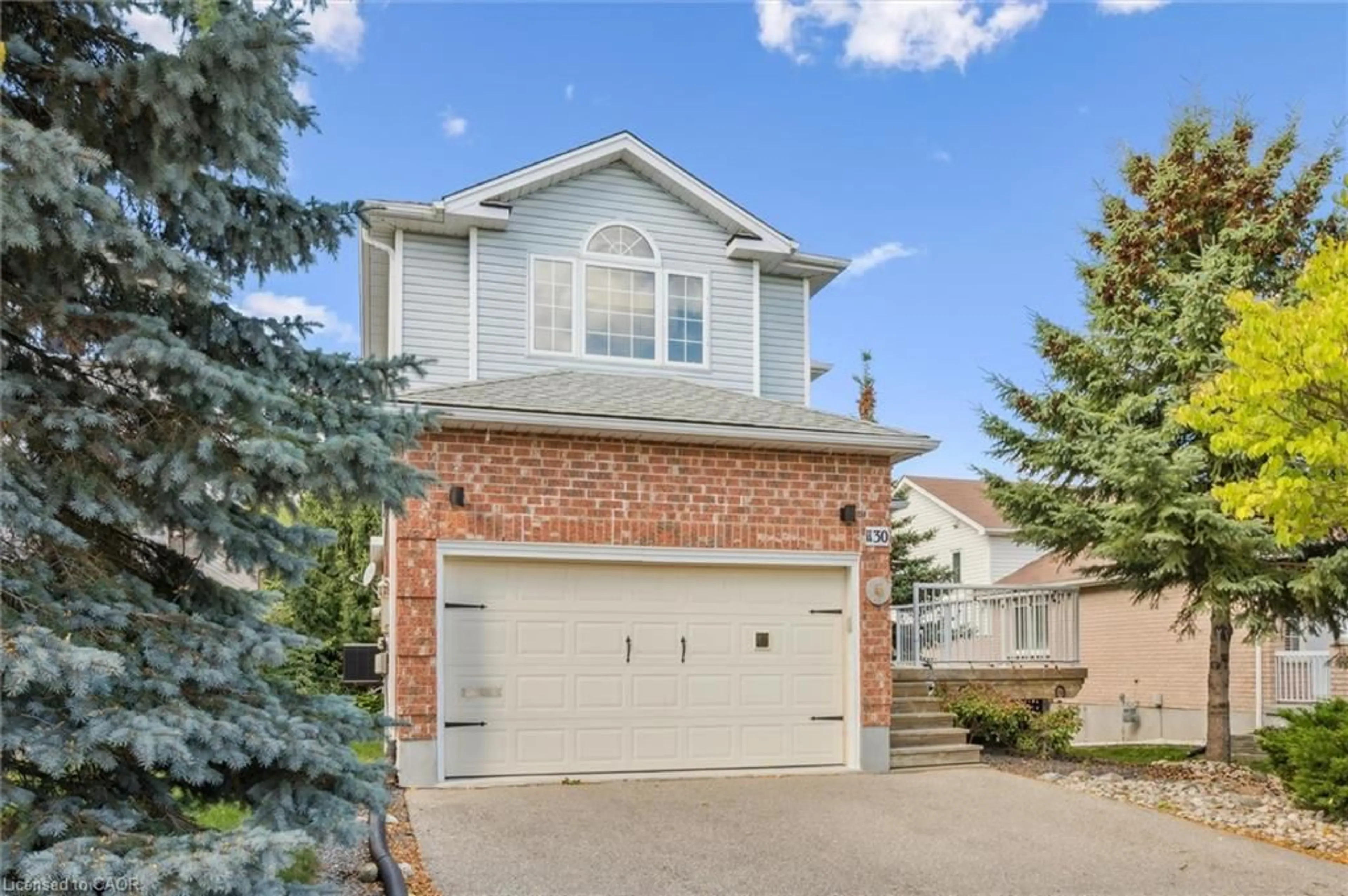 Home with brick exterior material, street for 1130 Countrystone Dr, Kitchener Ontario N2N 3L7