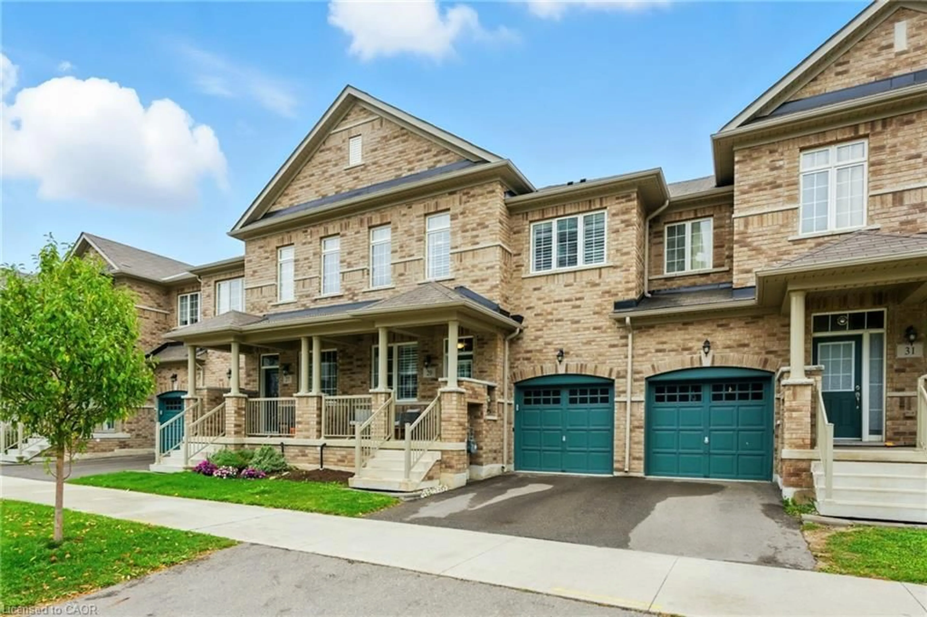 Home with brick exterior material, street for 29 Riverwalk Dr, Waterdown Ontario L8B 1X3