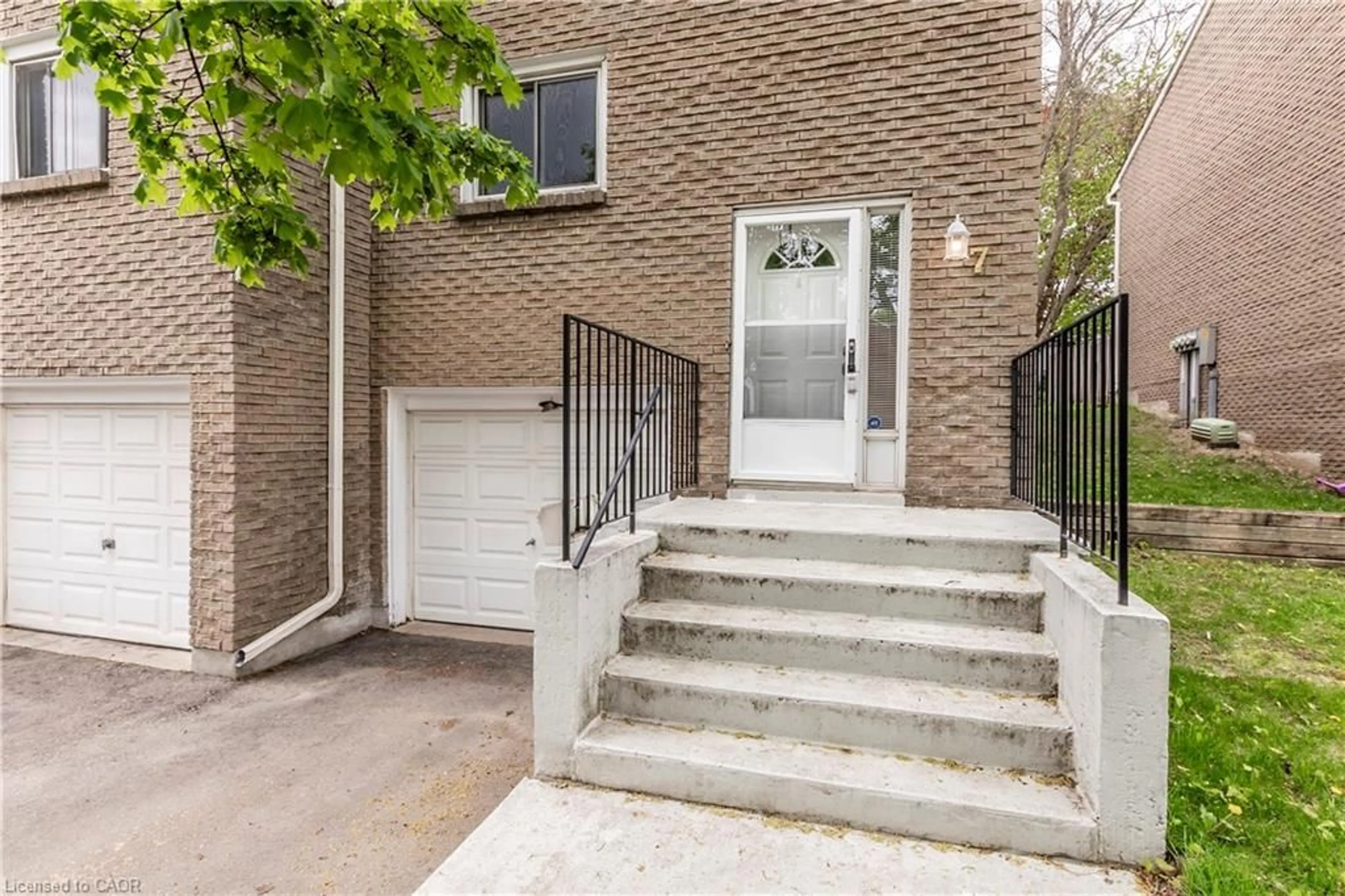 Home with brick exterior material, street for 121 Morgan Ave #7, Kitchener Ontario N2A 2M4