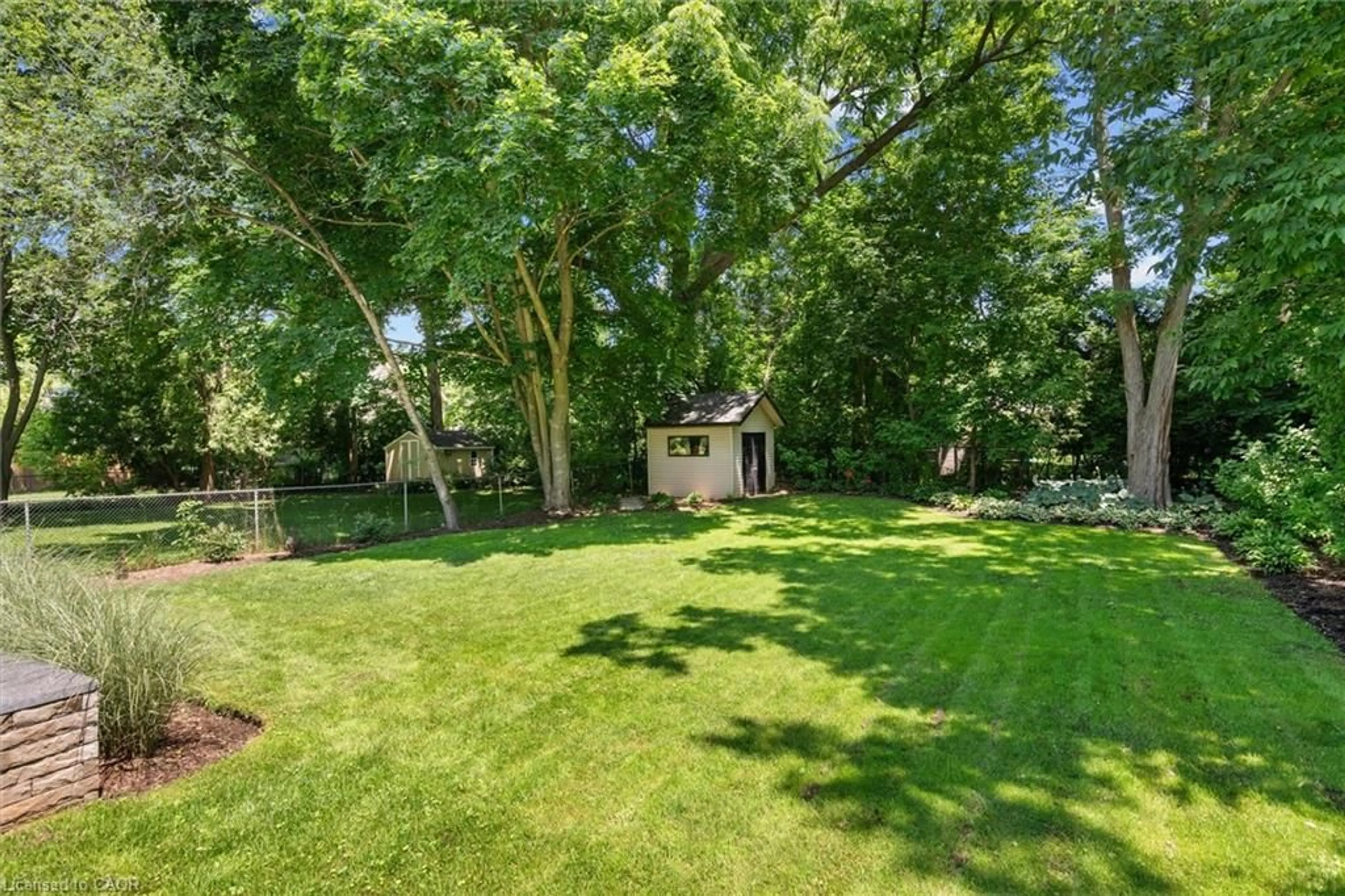 A pic from outside/outdoor area/front of a property/back of a property/a pic from drone, forest/trees view for 373 Torrance St, Burlington Ontario L7R 2R7