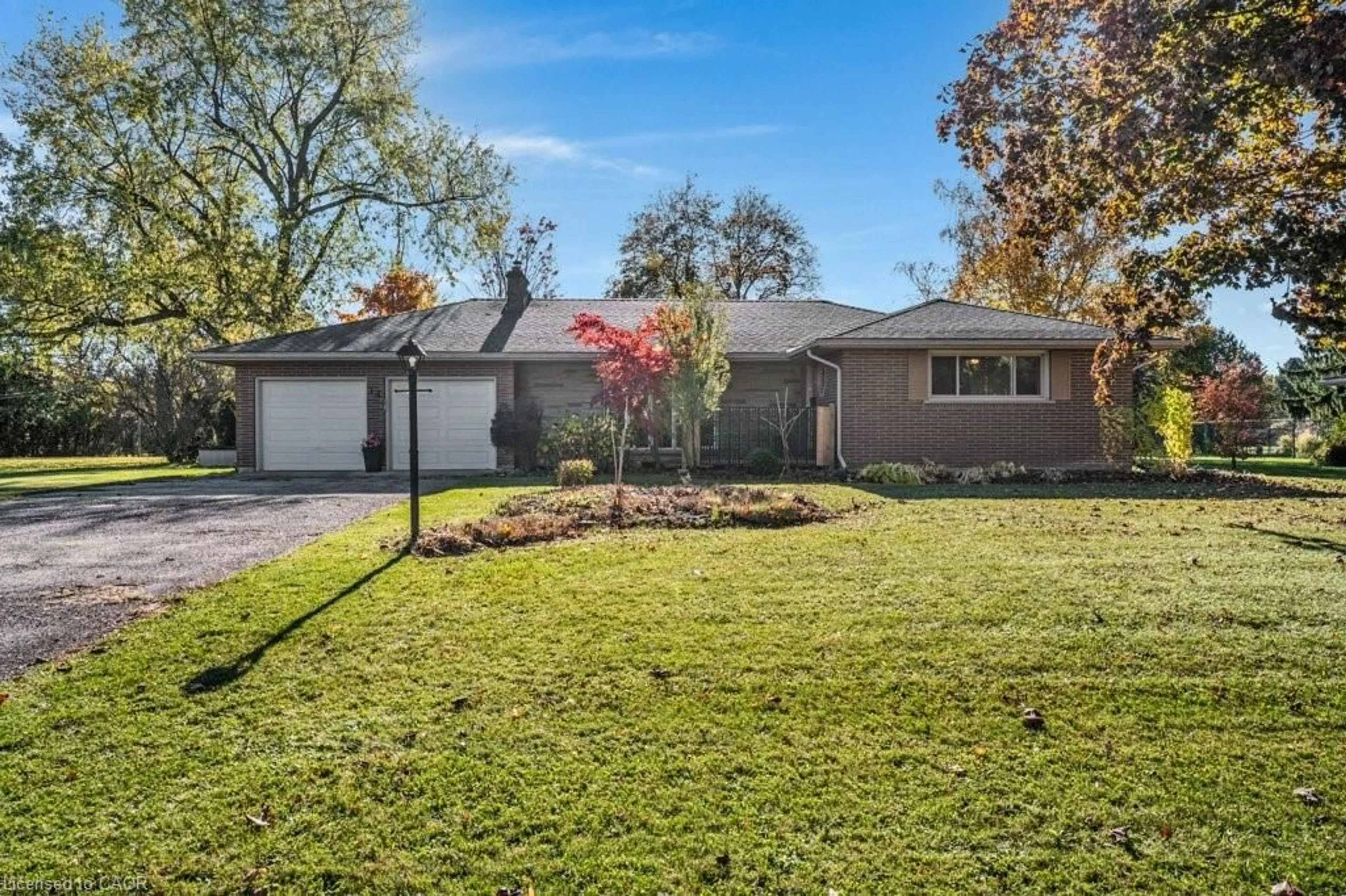 Home with brick exterior material, street for 14 Wilson Ave, Burford Ontario N0E 1A0