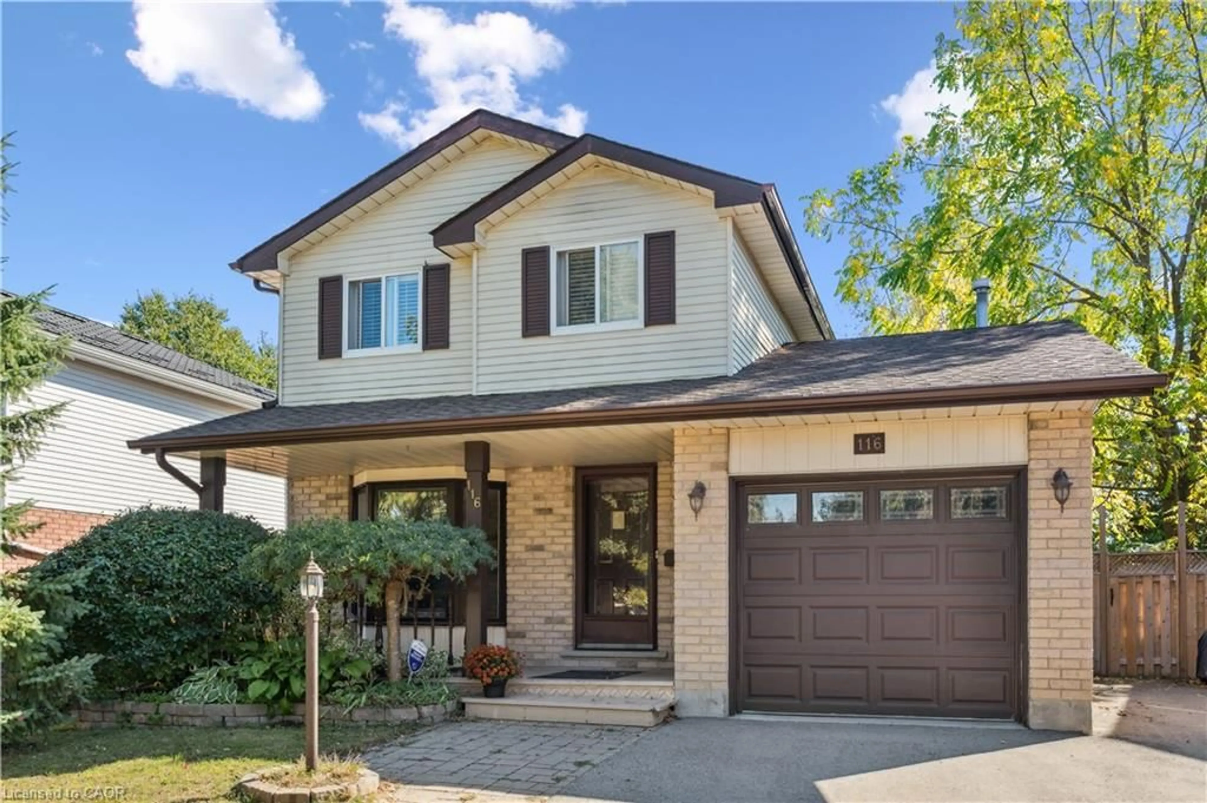 Home with brick exterior material, street for 116 Erinbrook Dr, Kitchener Ontario N2E 3C4