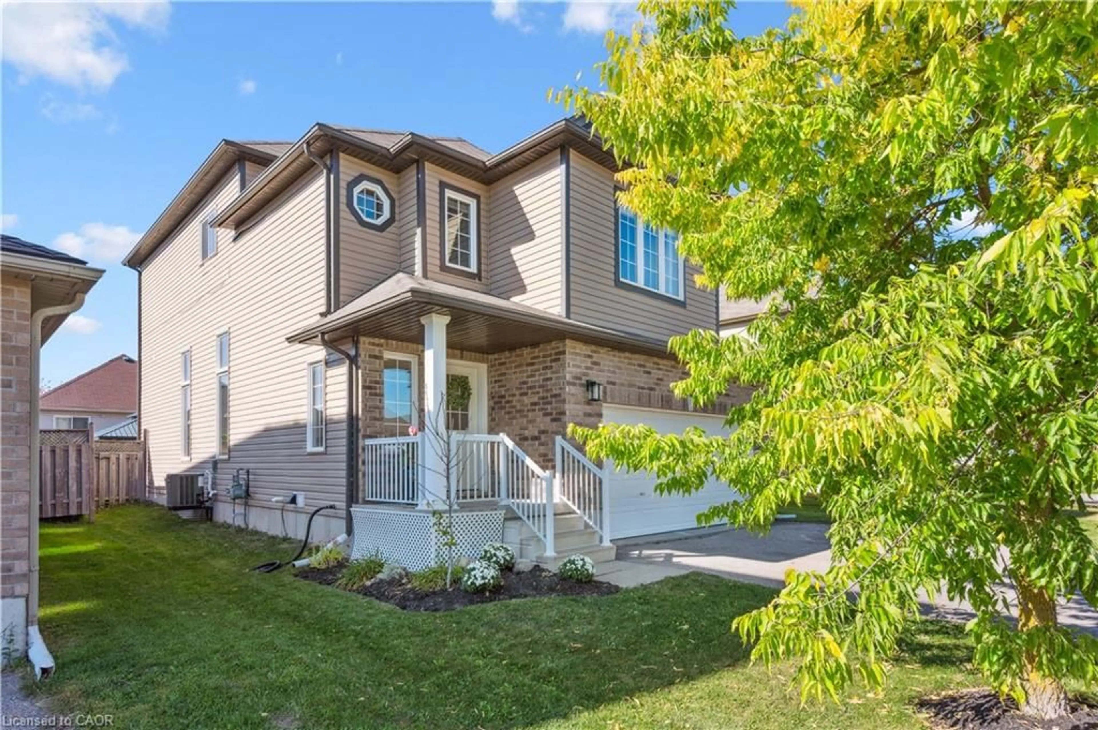 Home with vinyl exterior material, street for 665 Albert Ave, Listowel Ontario N4W 0A1