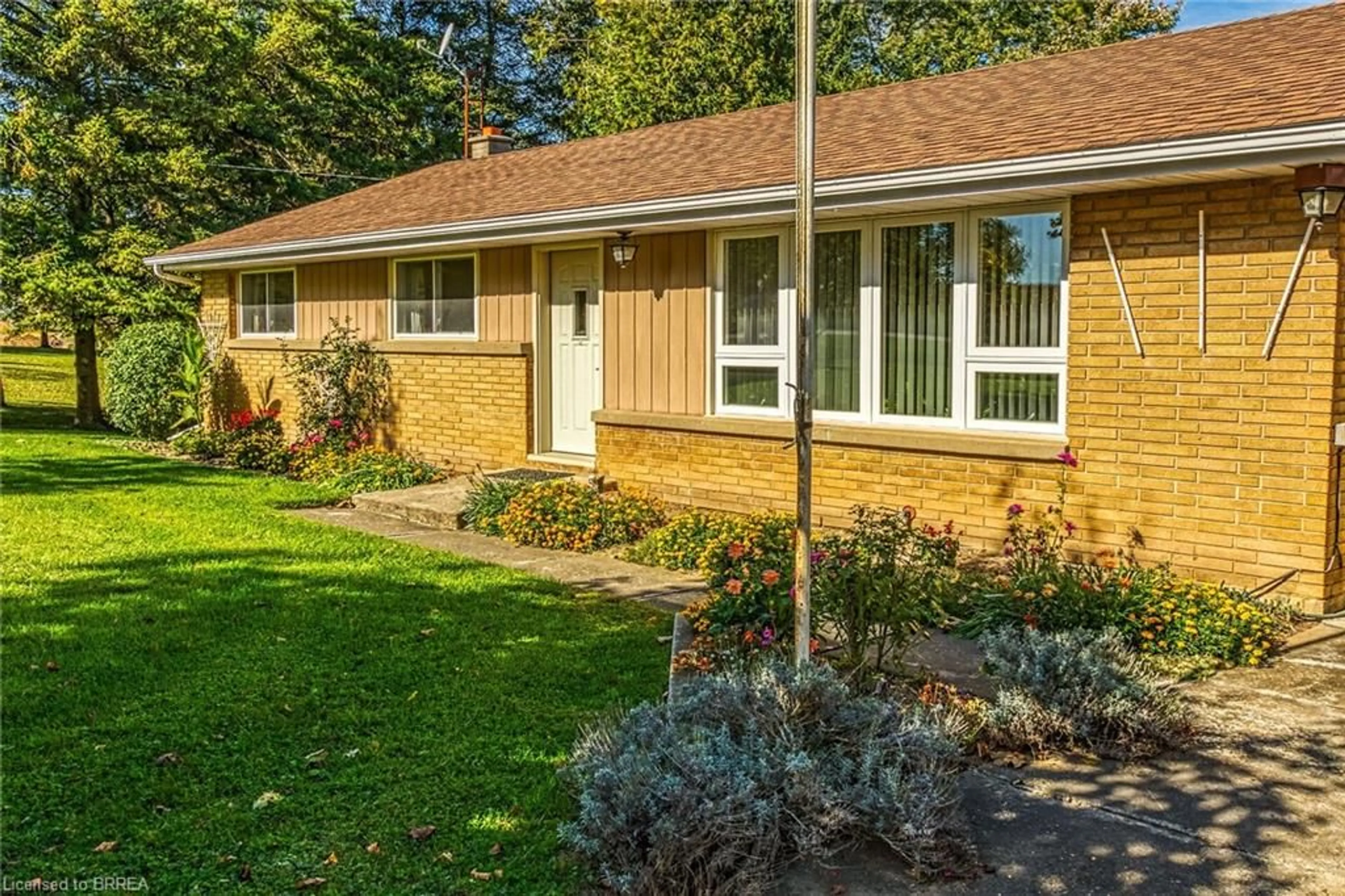 Home with brick exterior material, street for 169 Governors Rd, Paris Ontario N3L 3E1