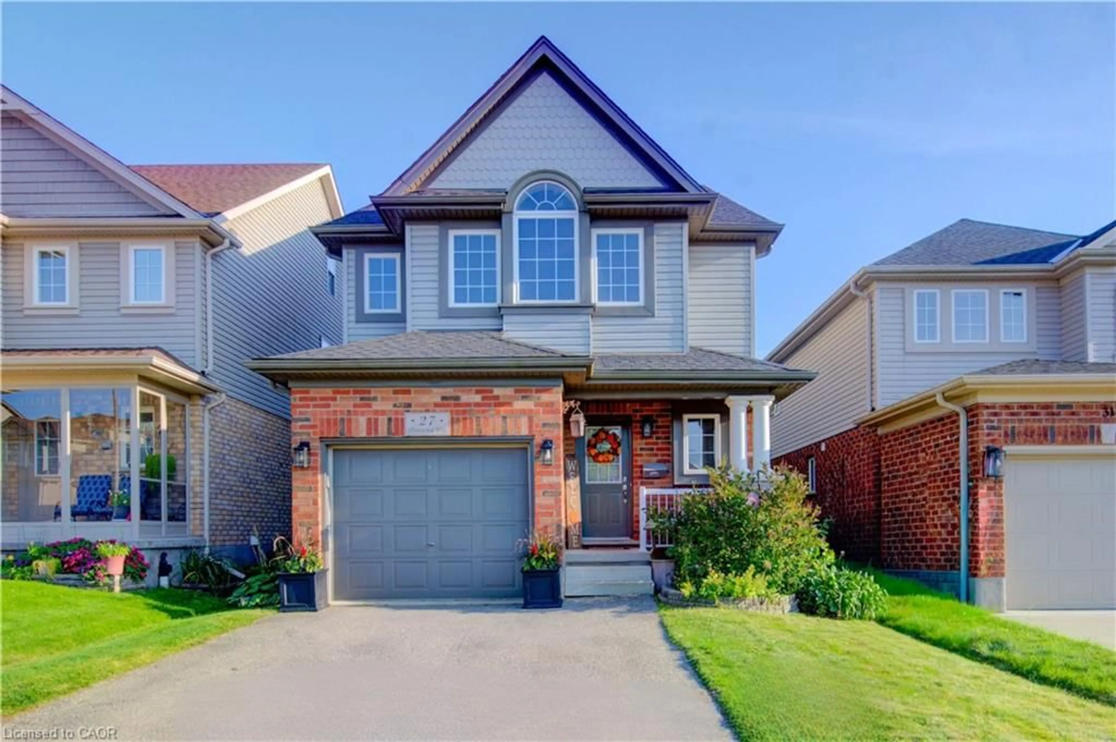 Home with brick exterior material, street for 27 Olivewood Way, Cambridge Ontario N3C 4N9