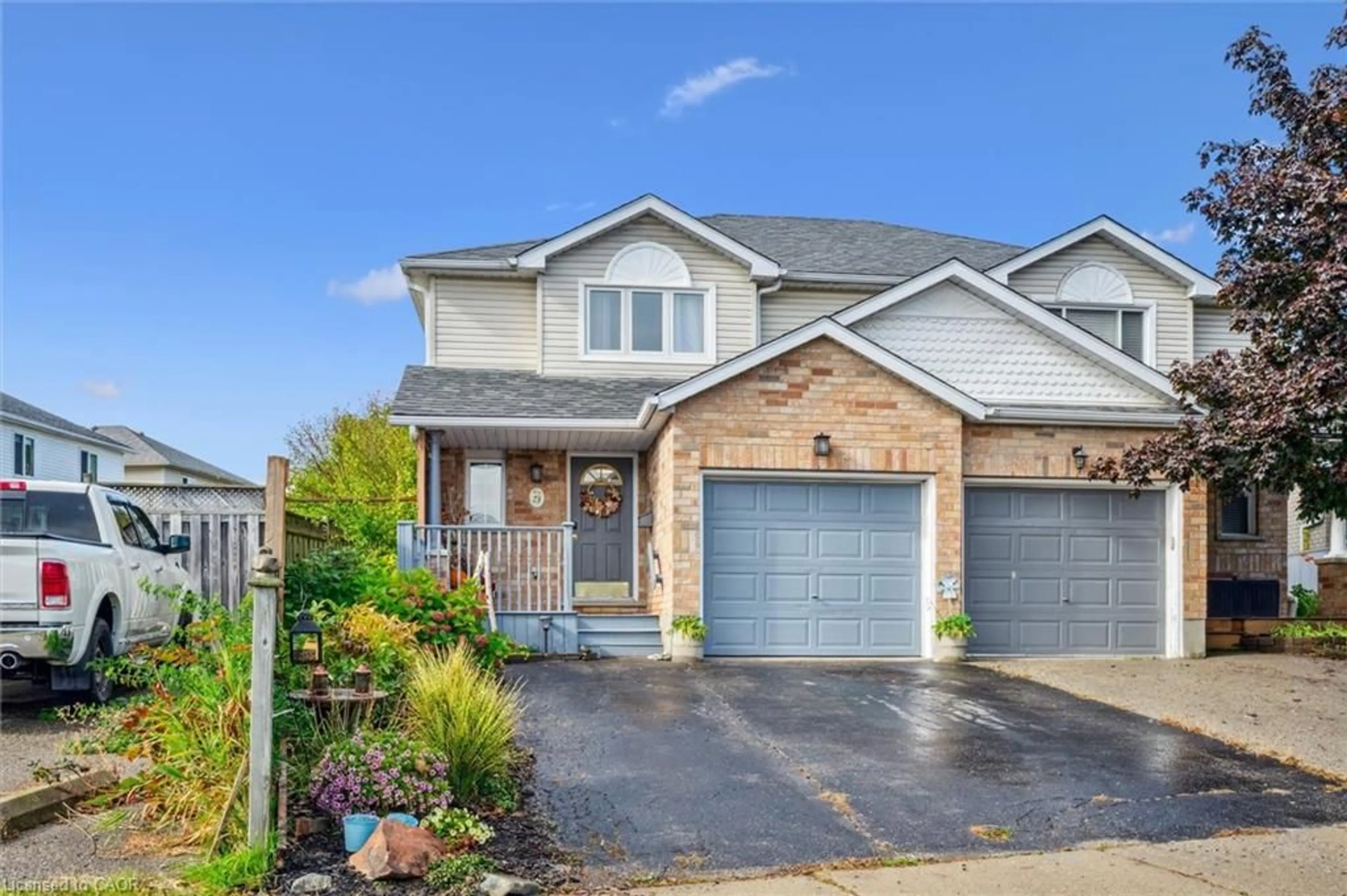 Home with brick exterior material, street for 73 Hackberry St, Kitchener Ontario N2E 3P9