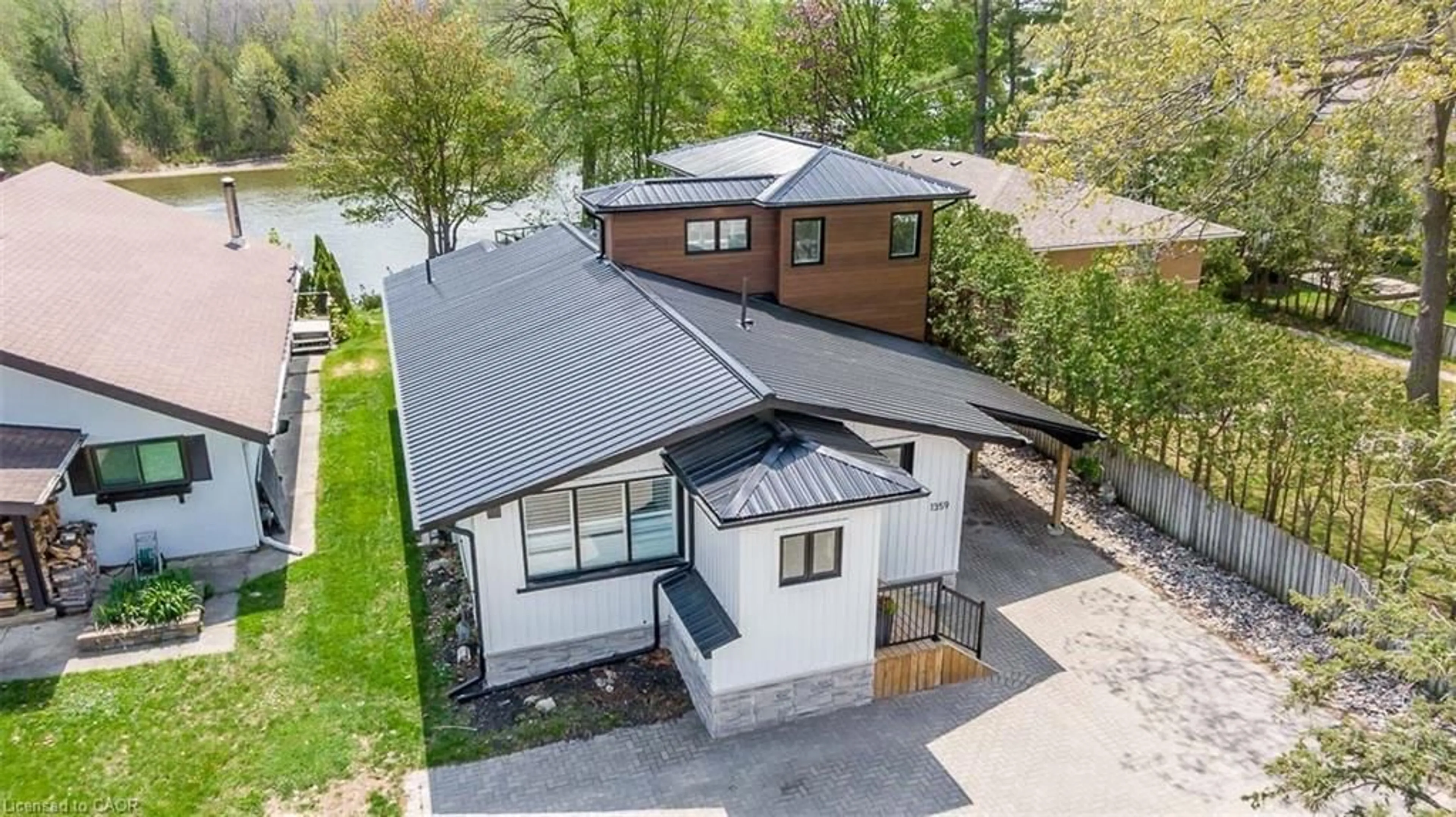 A pic from outside/outdoor area/front of a property/back of a property/a pic from drone, street for 1359 Mosley St, Wasaga Beach Ontario L9Z 2C7