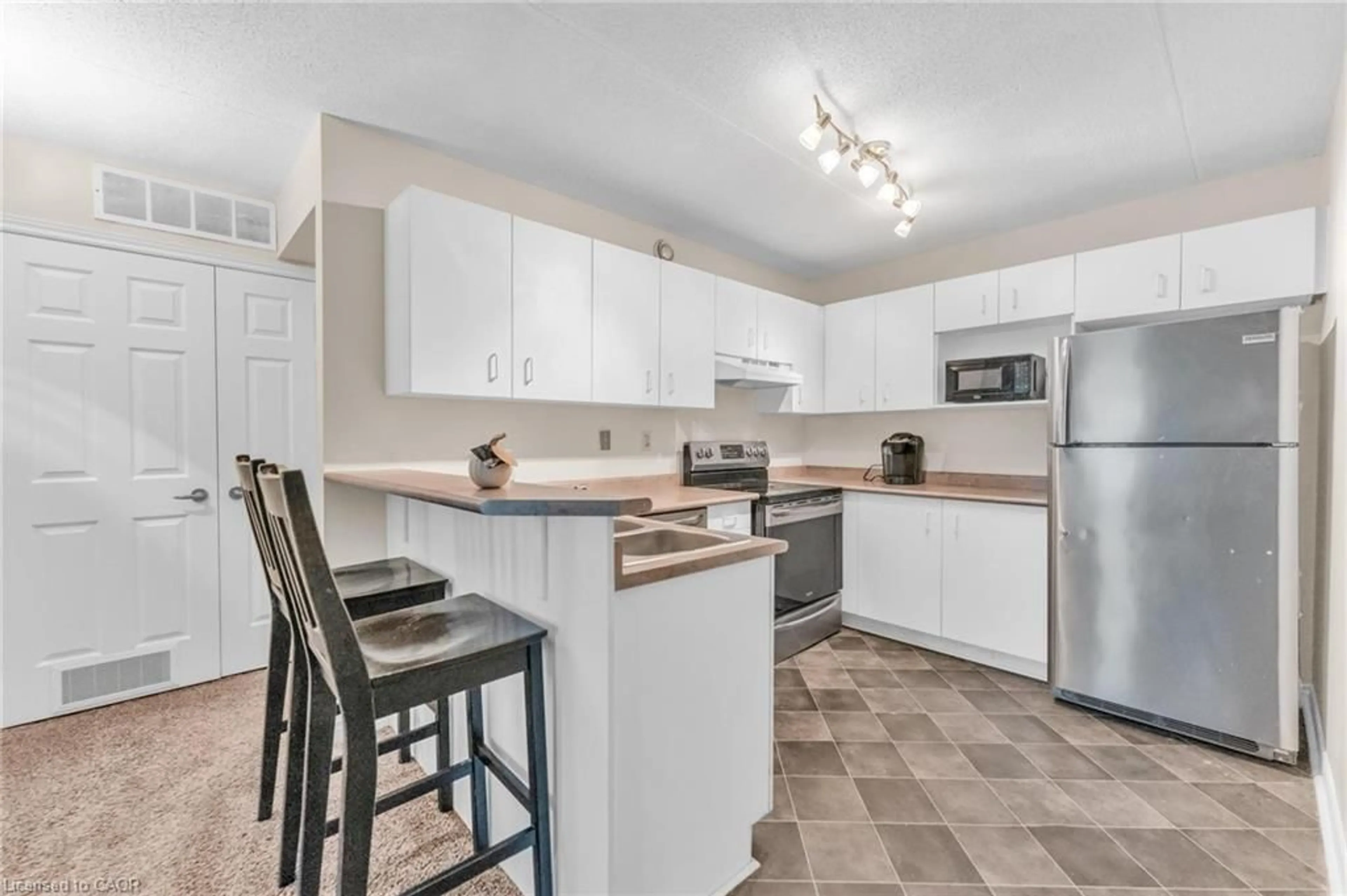 Standard kitchen, ceramic/tile floor for 2010 Cleaver Ave #207, Burlington Ontario L7M 4C1