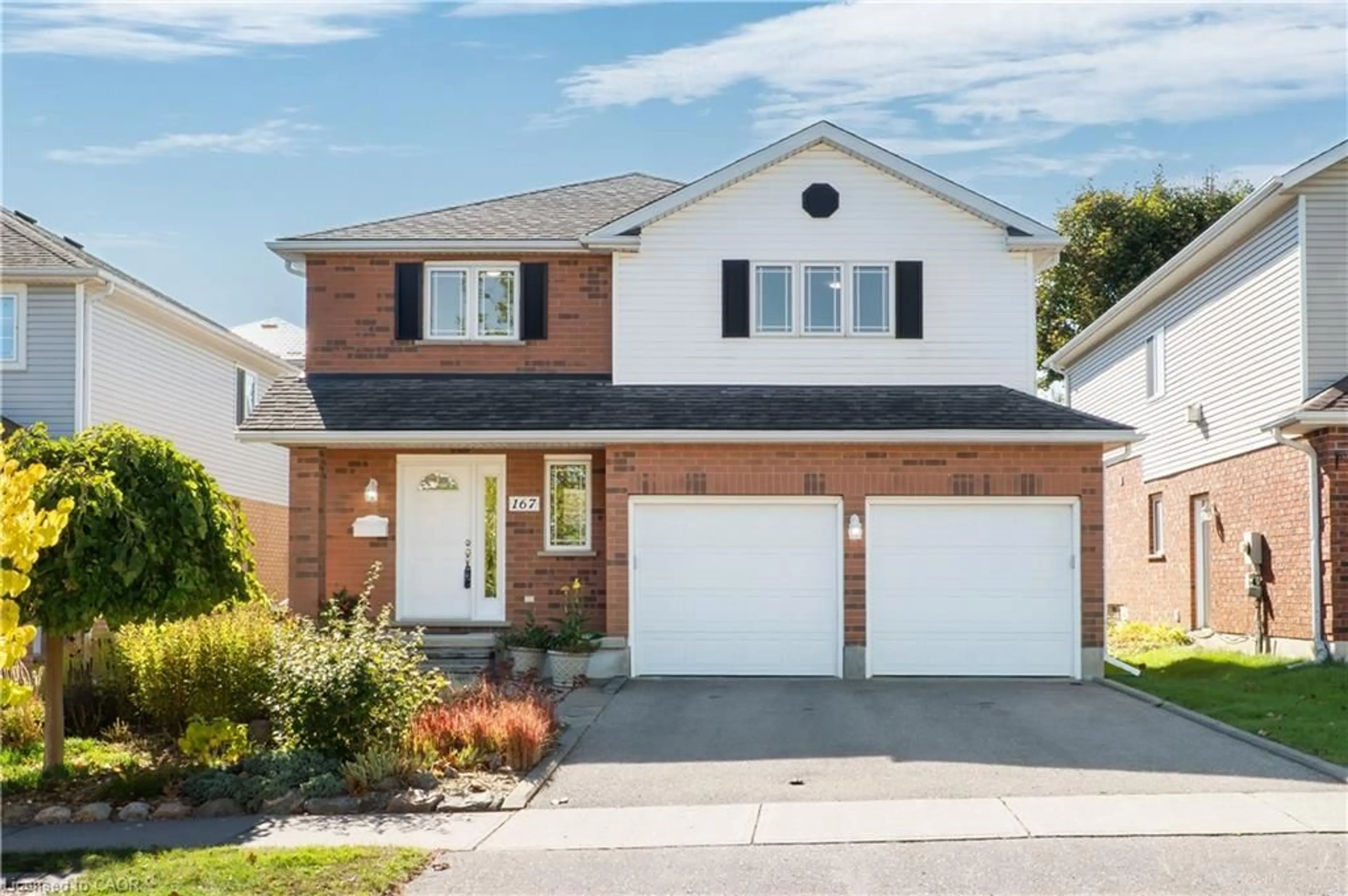 Home with brick exterior material, street for 167 Bridgewater Cres, Waterloo Ontario N2T 2M1