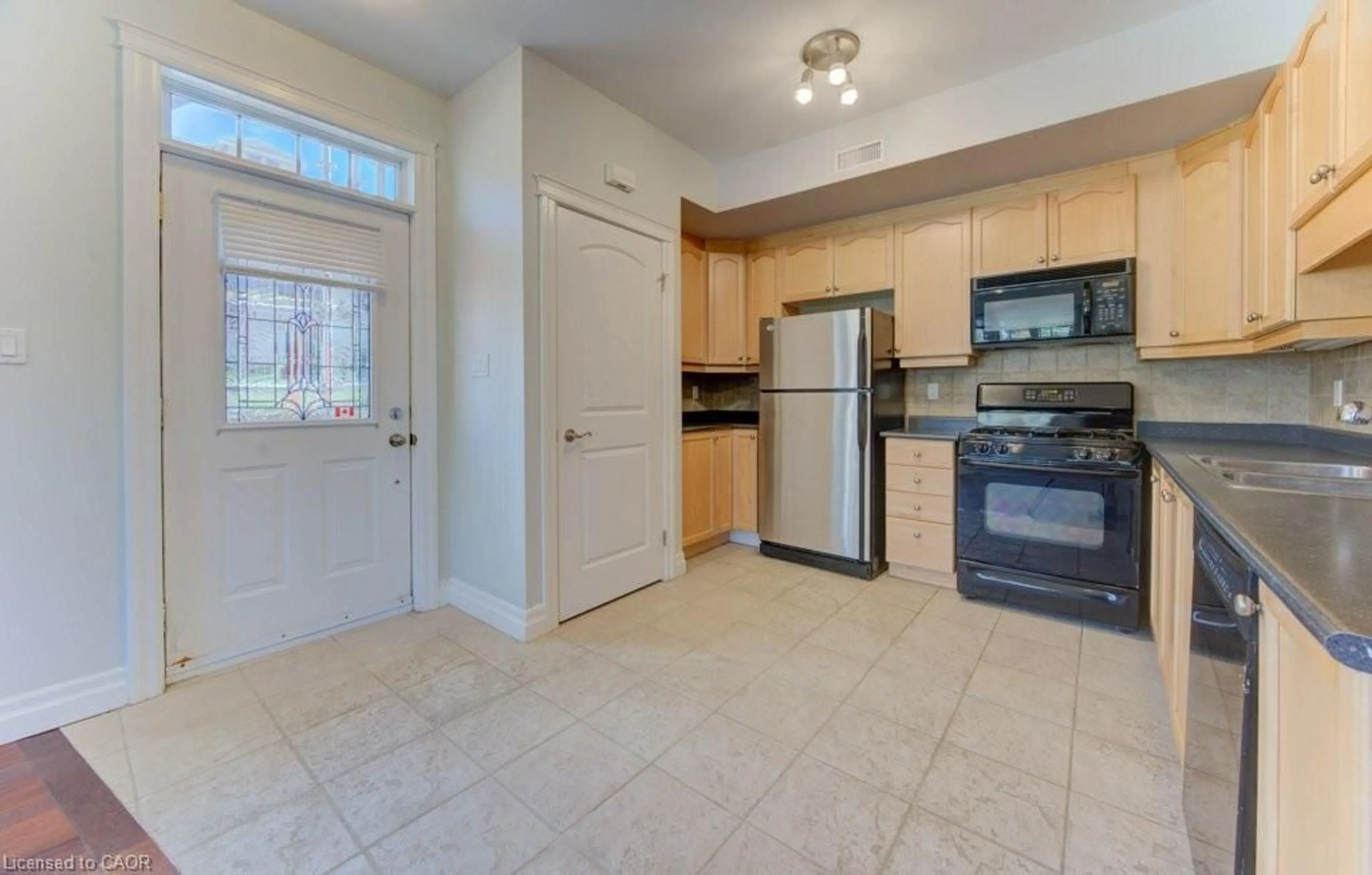 Standard kitchen, ceramic/tile floor for 555 King St #101, Kitchener Ontario N2G 2L9