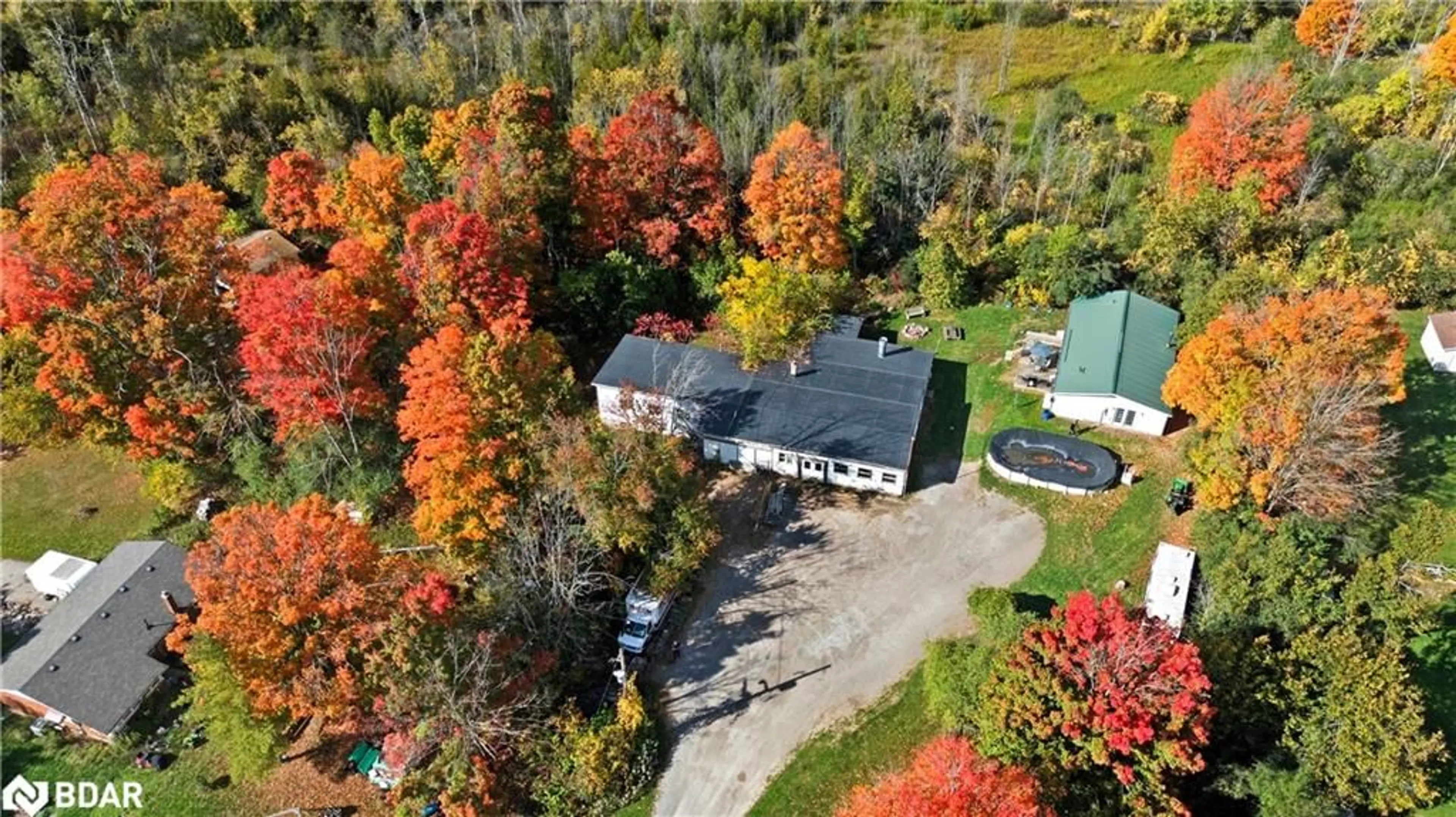 A pic from outside/outdoor area/front of a property/back of a property/a pic from drone, street for 122 County Road 4 Rd, Douro Ontario K0L 1S0
