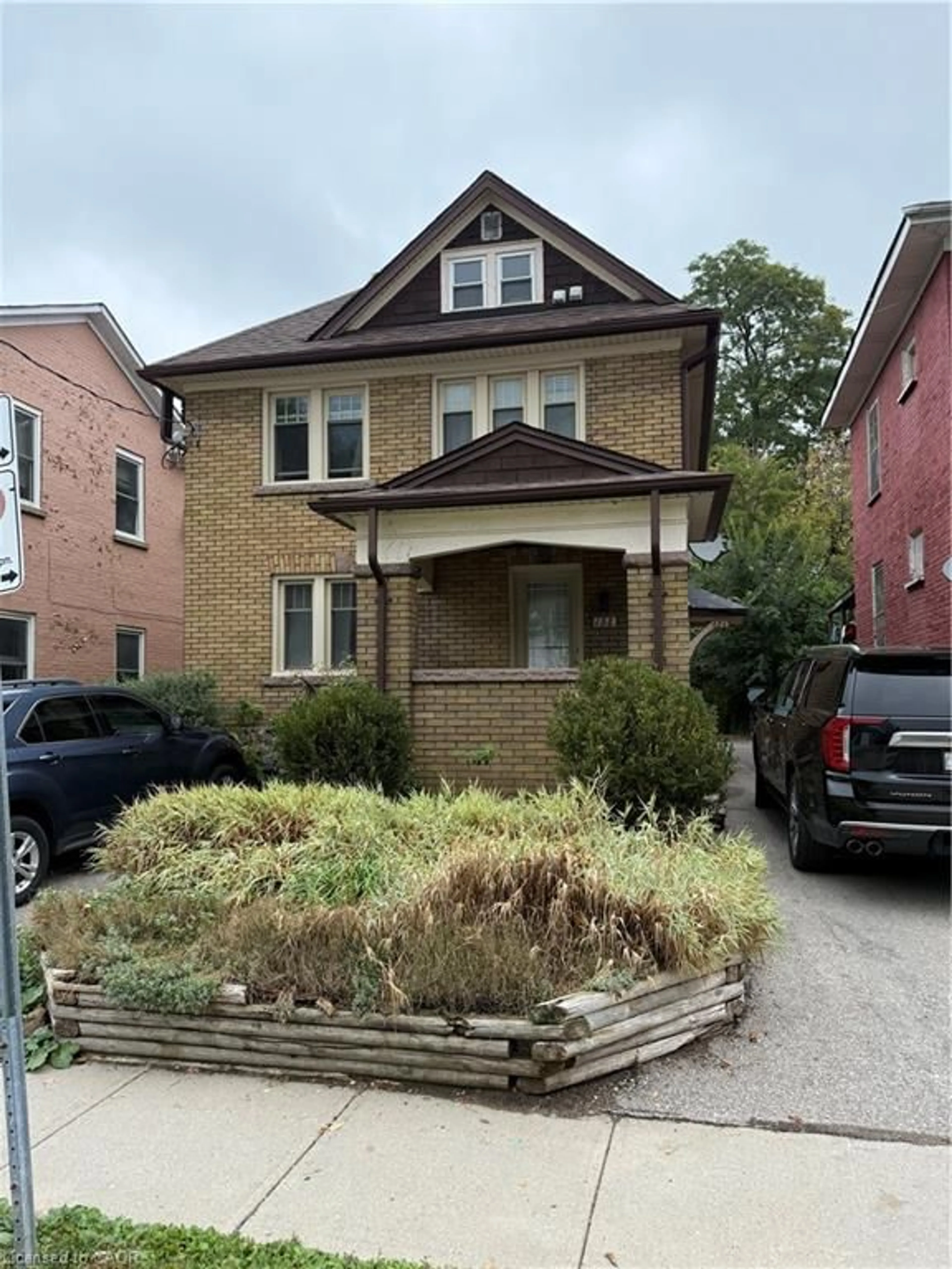 Home with brick exterior material, street for 154 Church St, Kitchener Ontario N2G 2S6