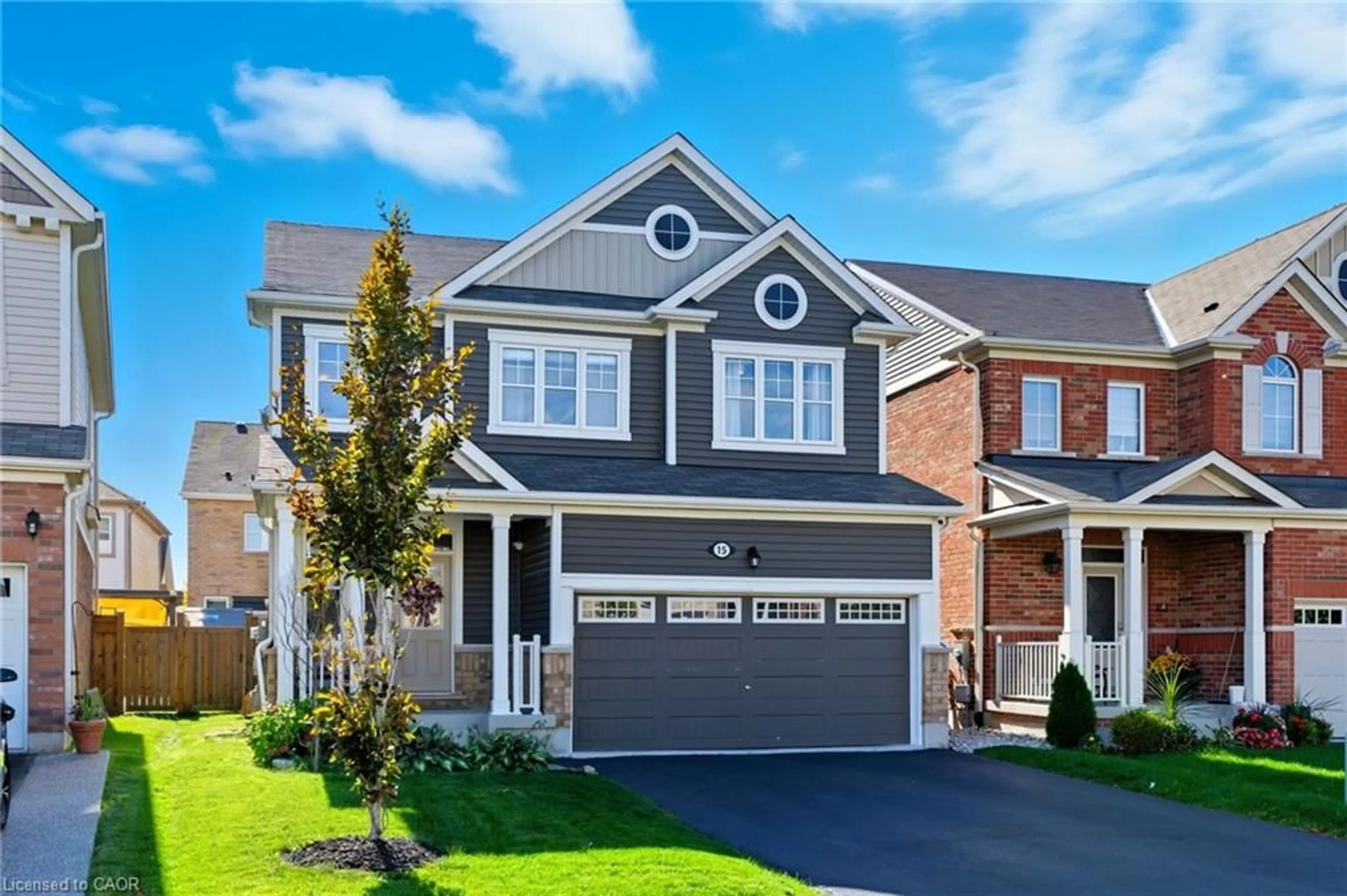 Home with vinyl exterior material, street for 15 Bastia St, Waterdown Ontario L8B 1V3