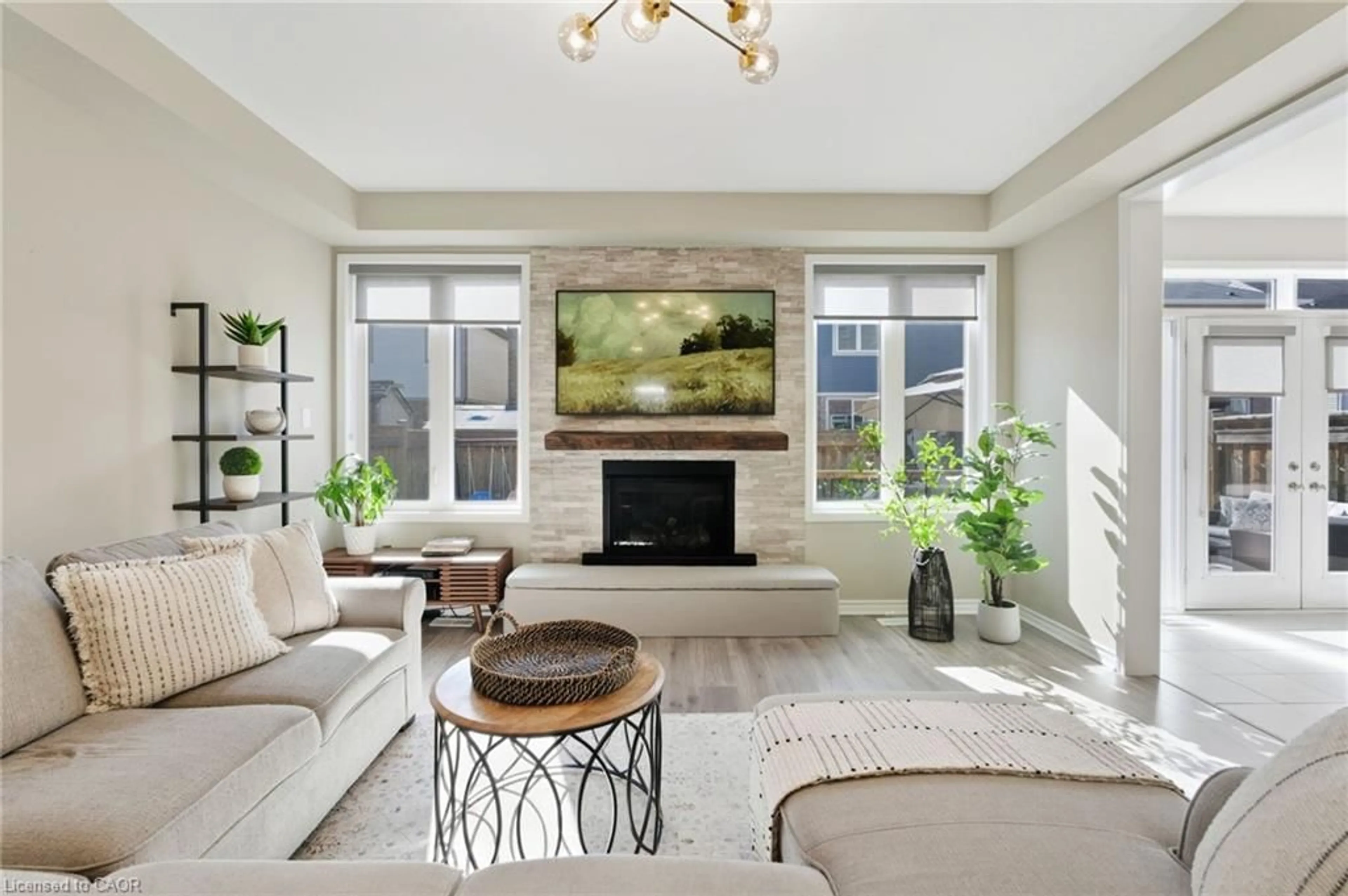 Living room with furniture, ceramic/tile floor for 15 Bastia St, Waterdown Ontario L8B 1V3