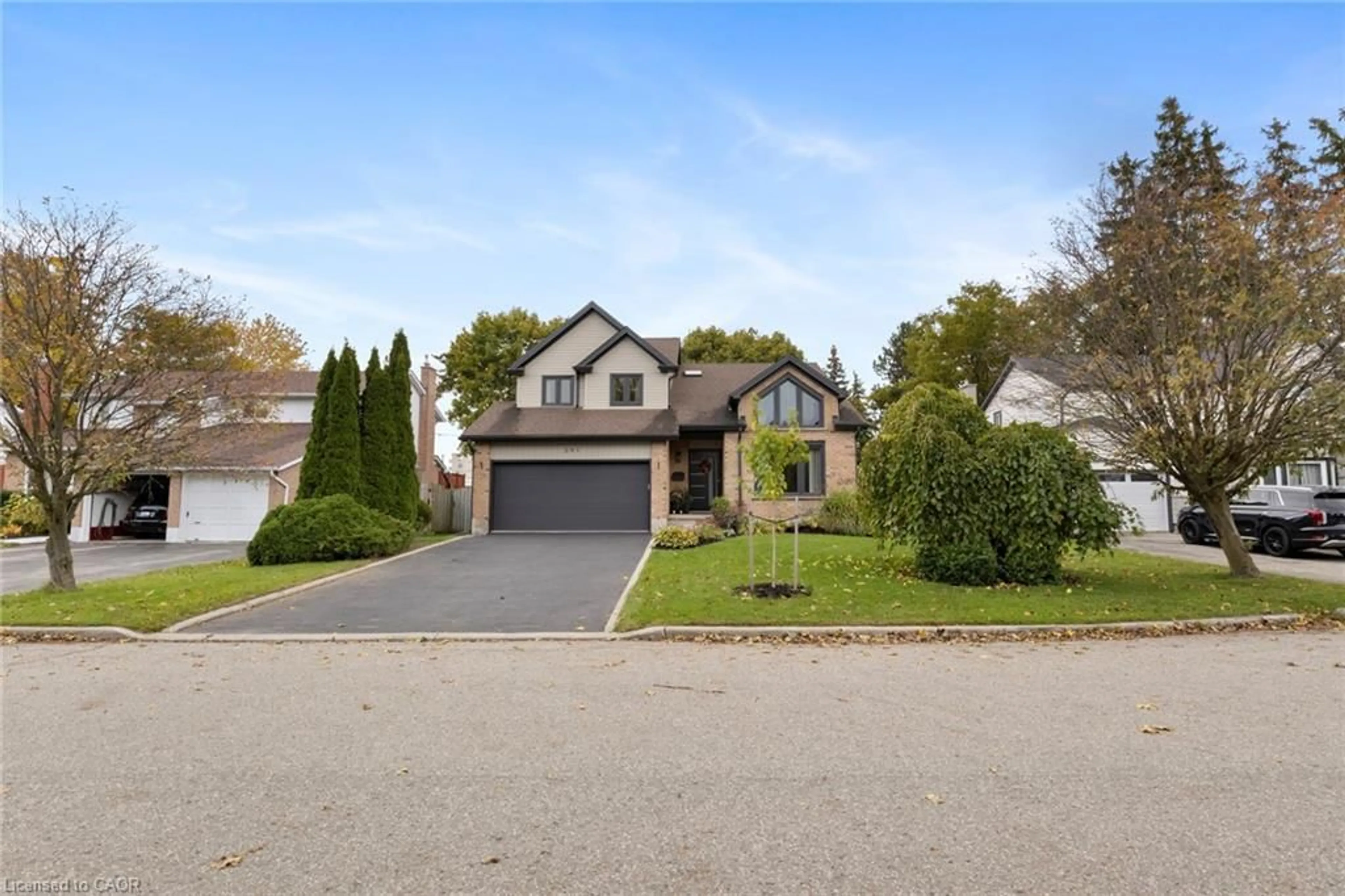Home with brick exterior material, street for 391 Strawberry Cres, Waterloo Ontario N2K 3J4