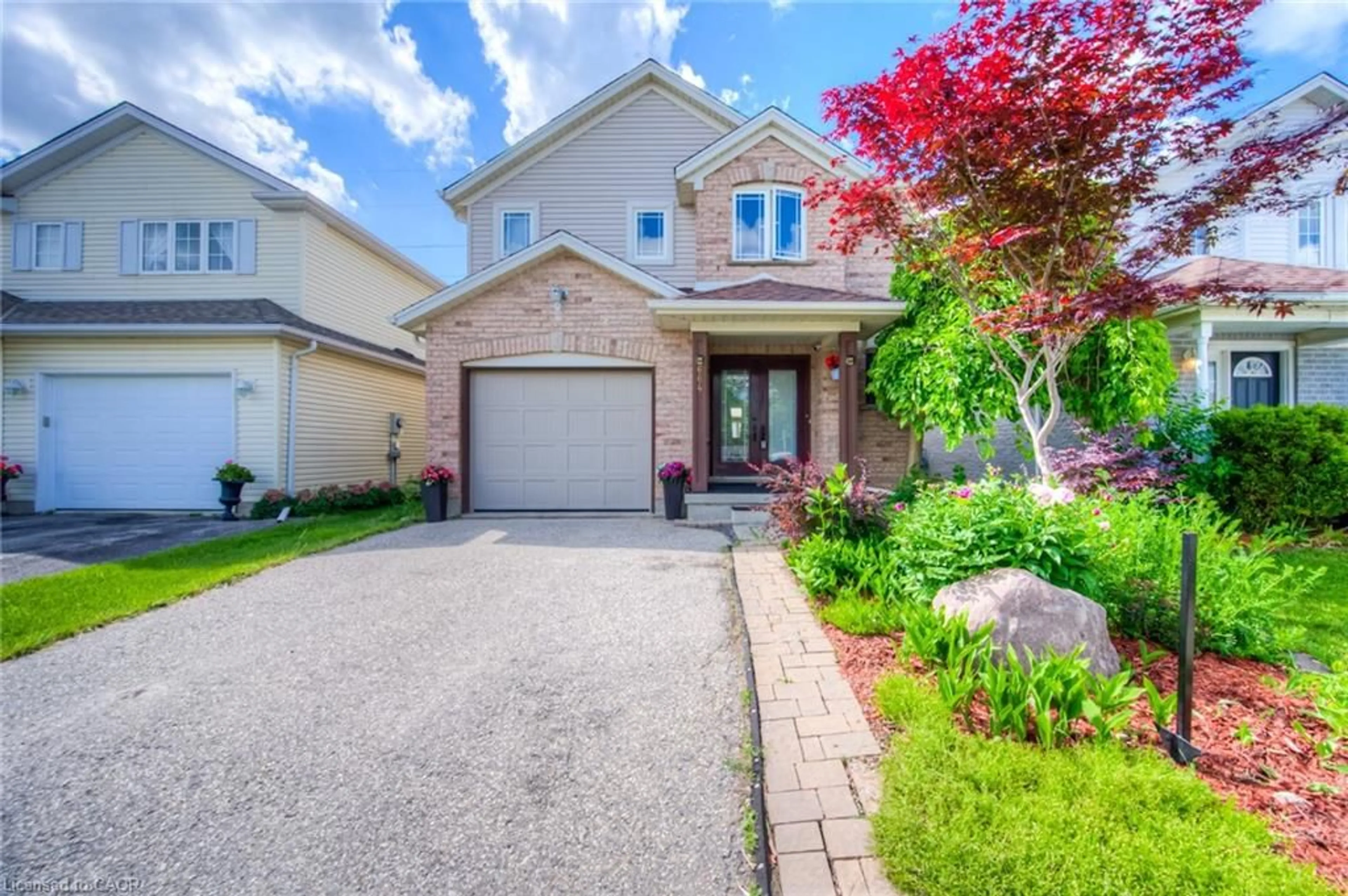 Home with brick exterior material, street for 664 Brandenburg Blvd, Waterloo Ontario N2T 2V4