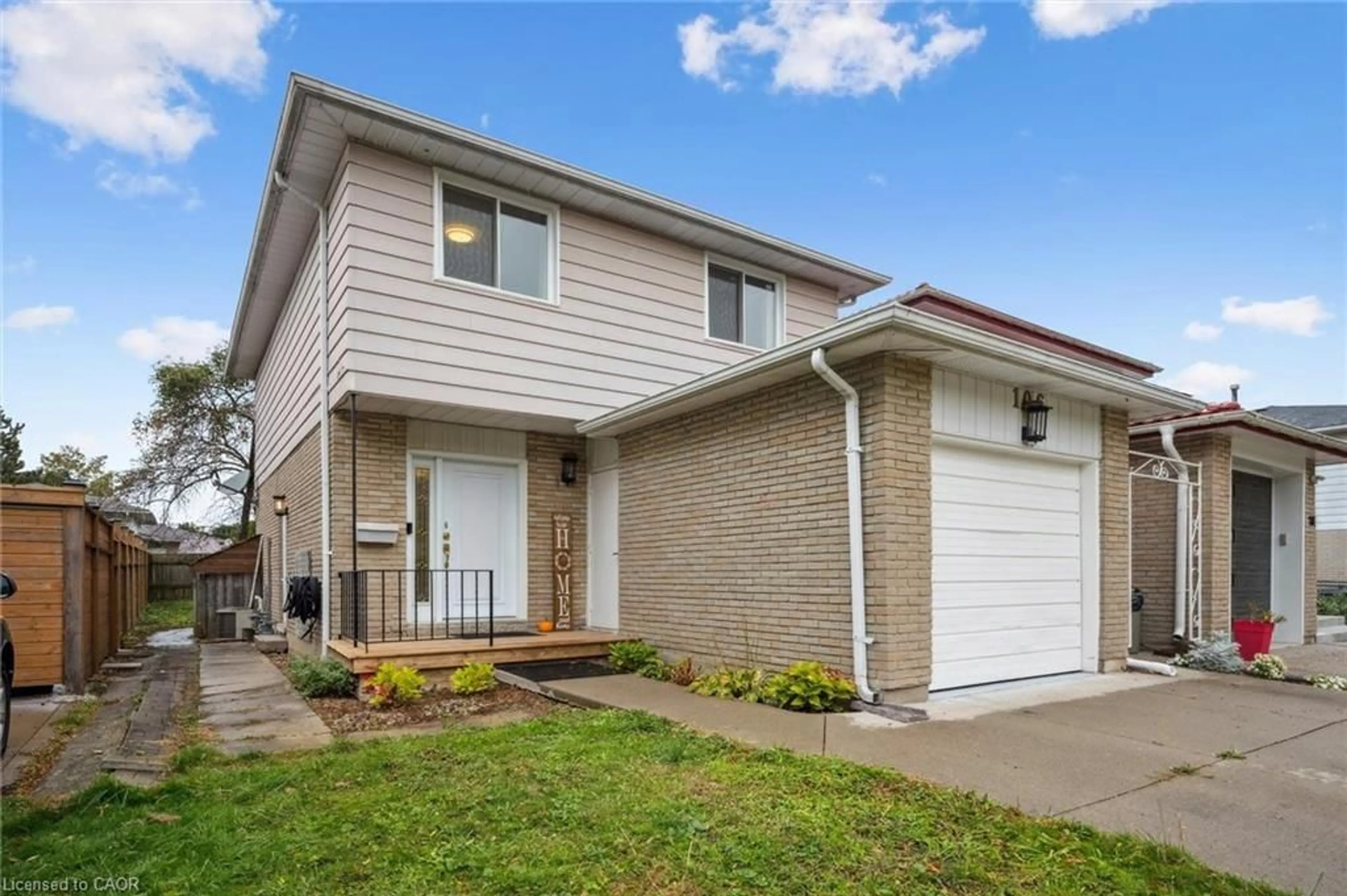 Home with brick exterior material, street for 106 Dalegrove Dr, Kitchener Ontario N2M 2G5