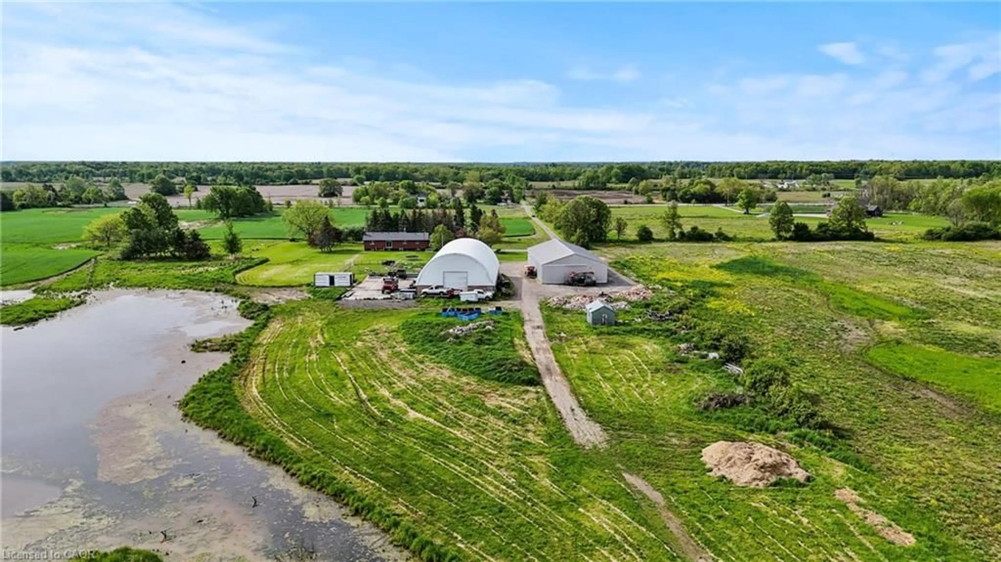 A pic from outside/outdoor area/front of a property/back of a property/a pic from drone, water/lake/river/ocean view for 6128 Highway 3, Canfield Ontario N0A 1C0