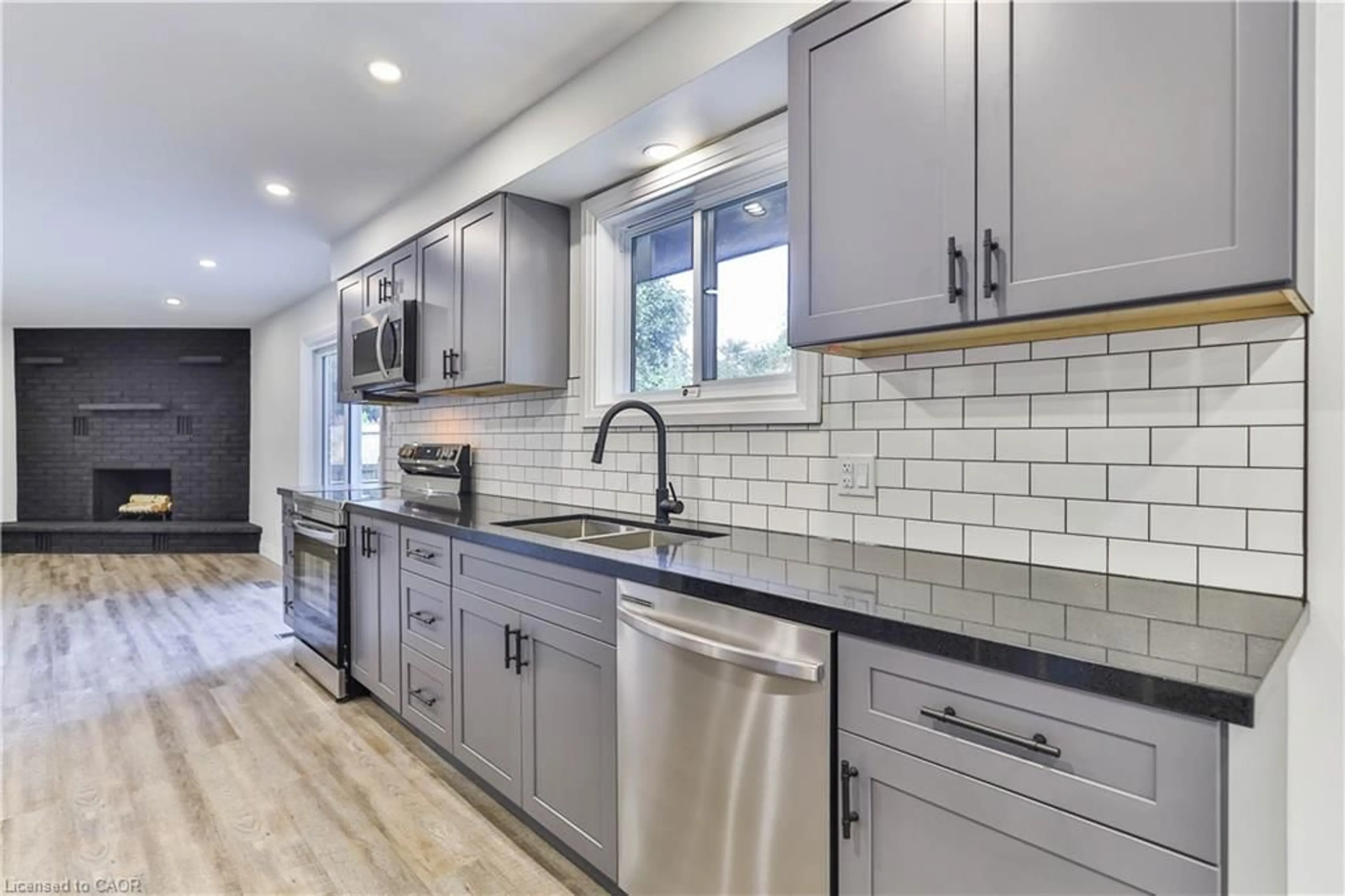 Open concept kitchen, ceramic/tile floor for 22 Atwood Cres, Simcoe Ontario N3Y 5A4