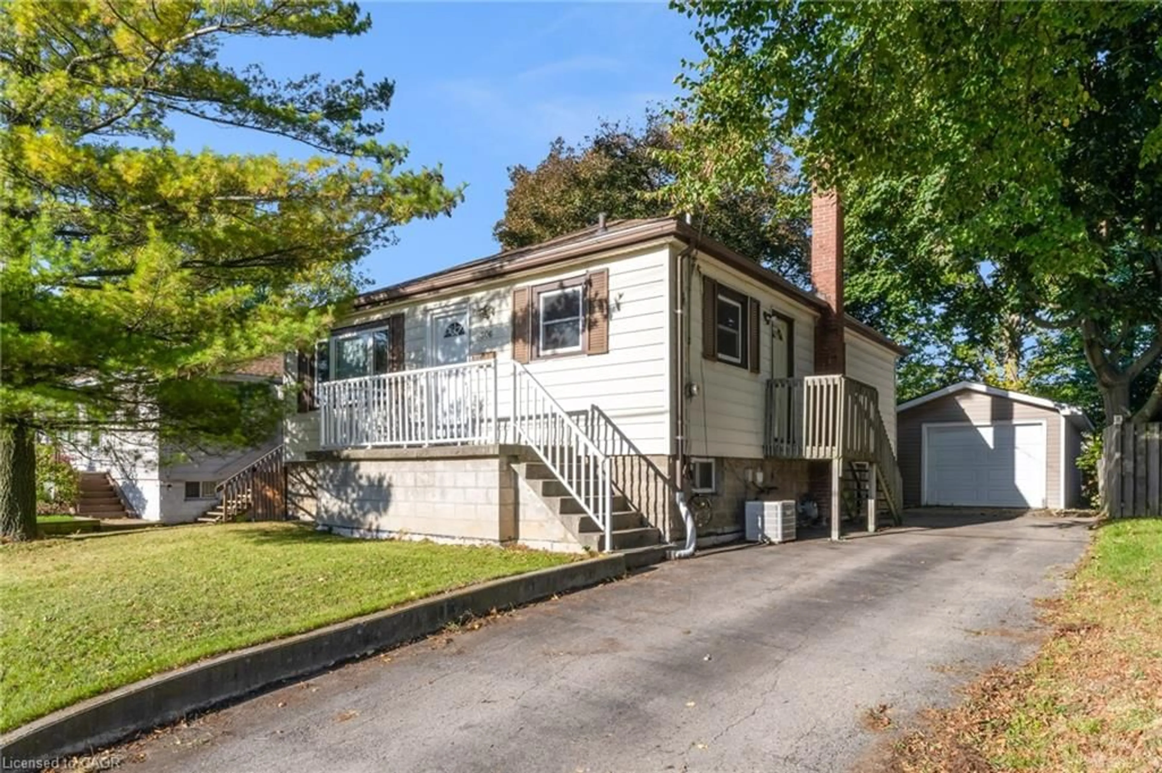 Home with vinyl exterior material, street for 306 West 2nd St, Hamilton Ontario L9C 3H2