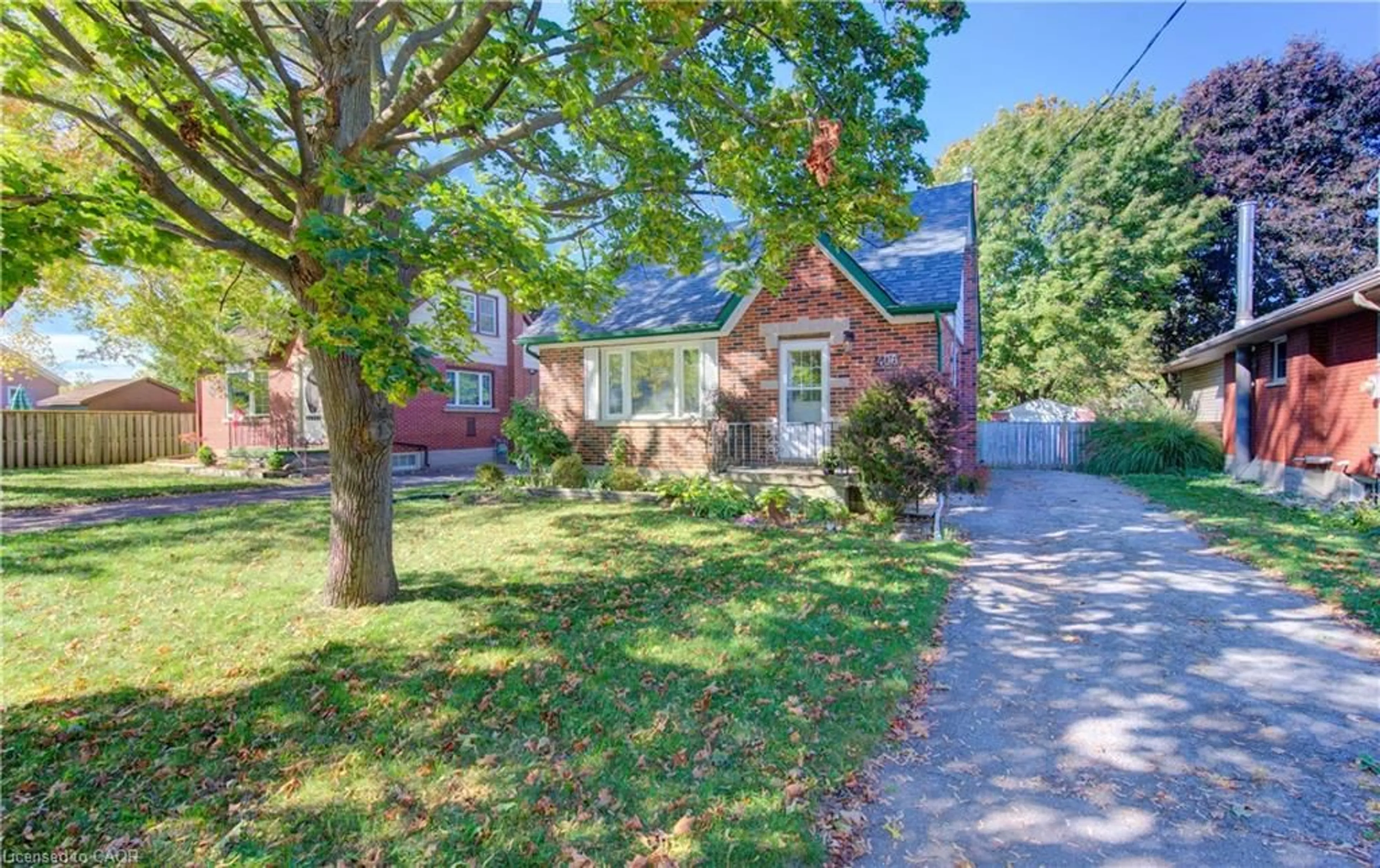Home with brick exterior material, street for 406 Ephraim St, Kitchener Ontario N2B 2C2
