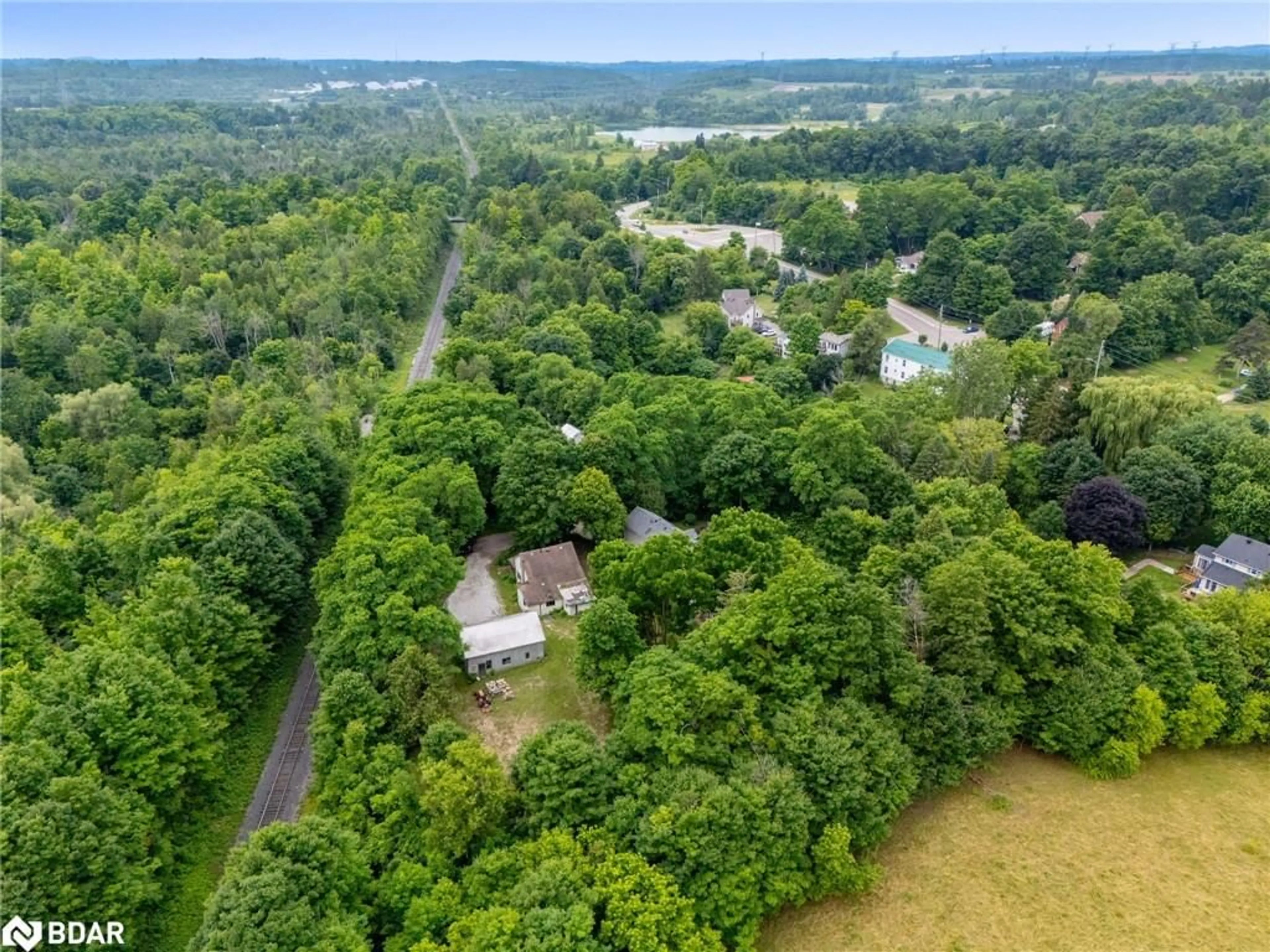 A pic from outside/outdoor area/front of a property/back of a property/a pic from drone, forest/trees view for 12363 Elizabeth St, Halton Hills Ontario L0P 1H0