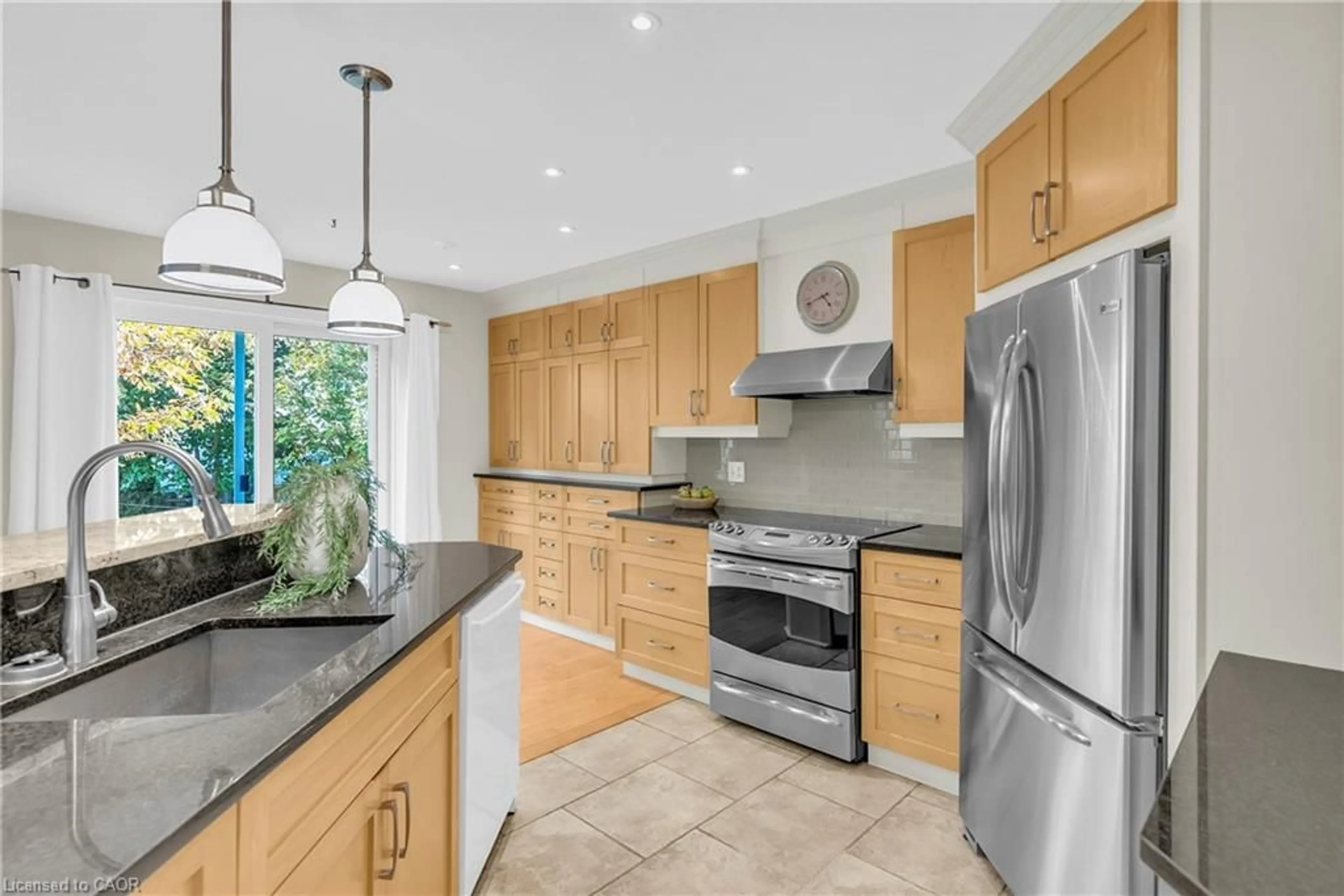 Open concept kitchen, ceramic/tile floor for 214 Dartmoor Cres, Waterloo Ontario N2K 3S9