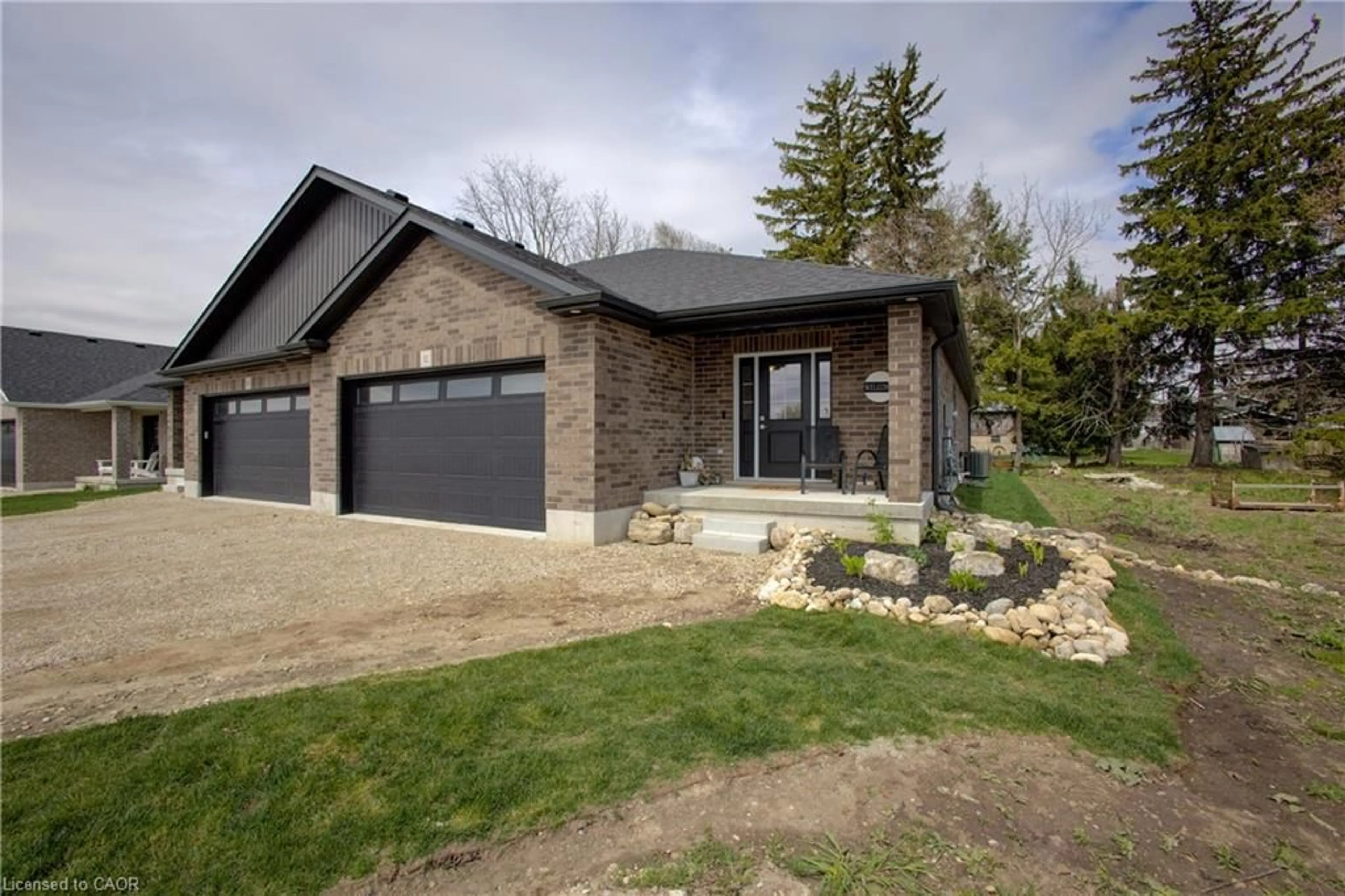 Home with brick exterior material, street for 11 Malcolm Cres, Listowel Ontario N4W 3X8