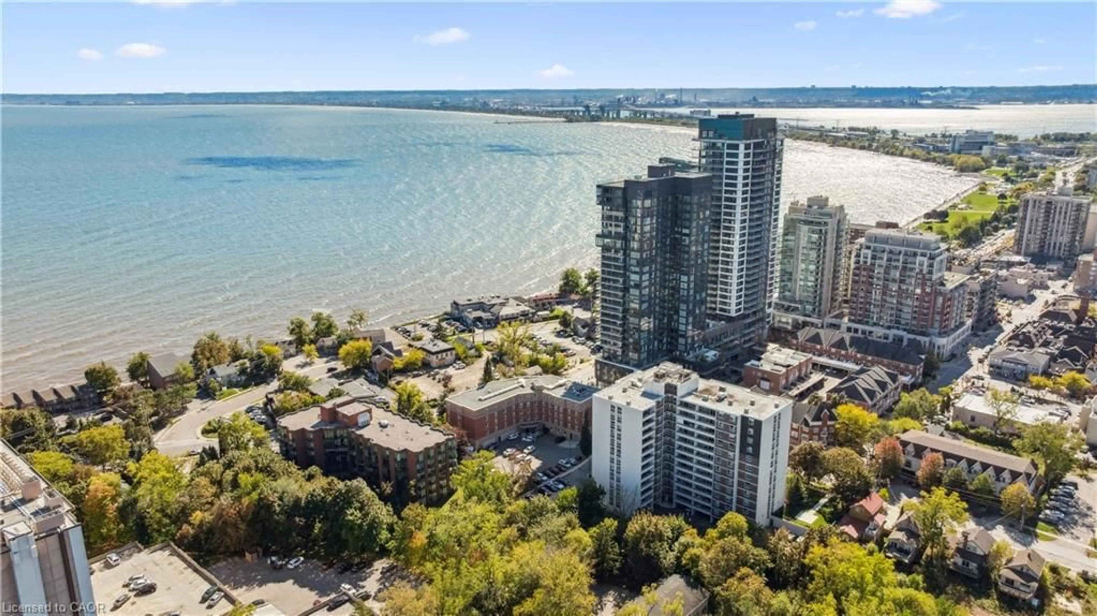 A pic from outside/outdoor area/front of a property/back of a property/a pic from drone, water/lake/river/ocean view for 2121 Lakeshore Rd #401, Burlington Ontario L7R 1C9