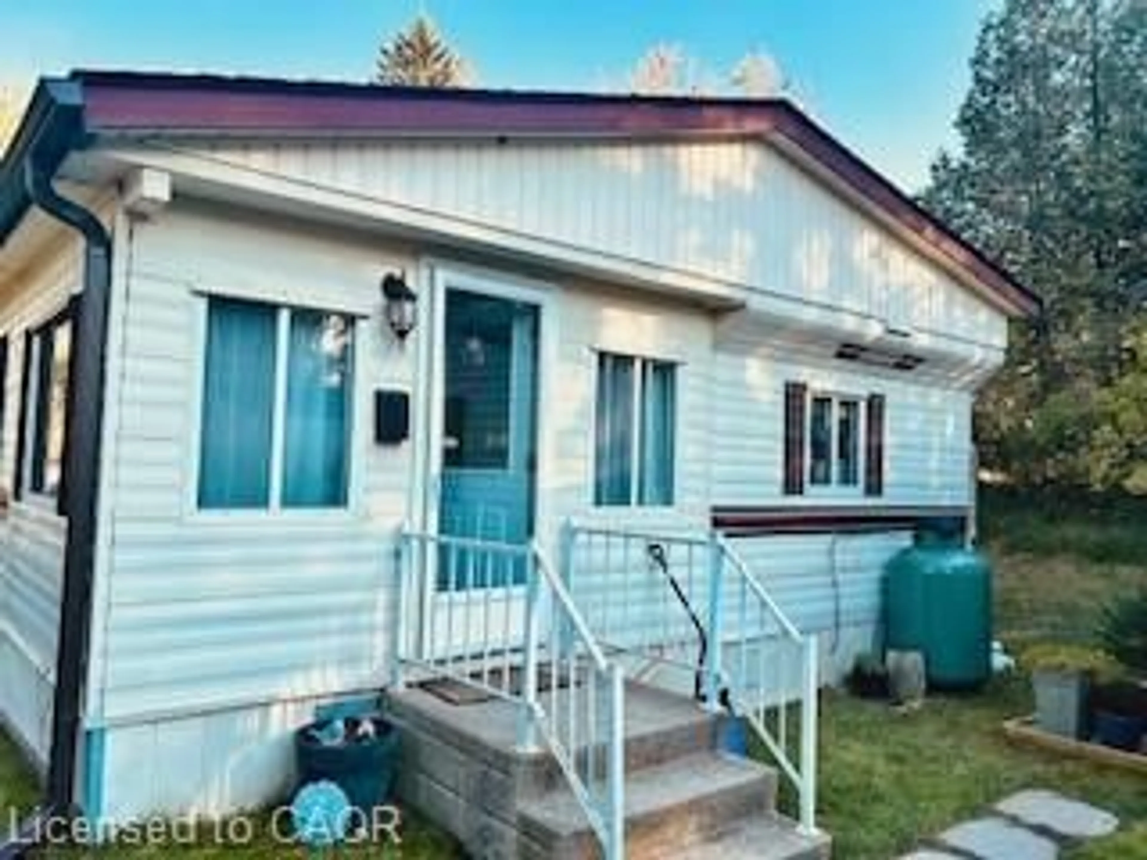 Home with vinyl exterior material, street for 673 Brant Waterloo Rd #503, Ayr Ontario N0B 1E0