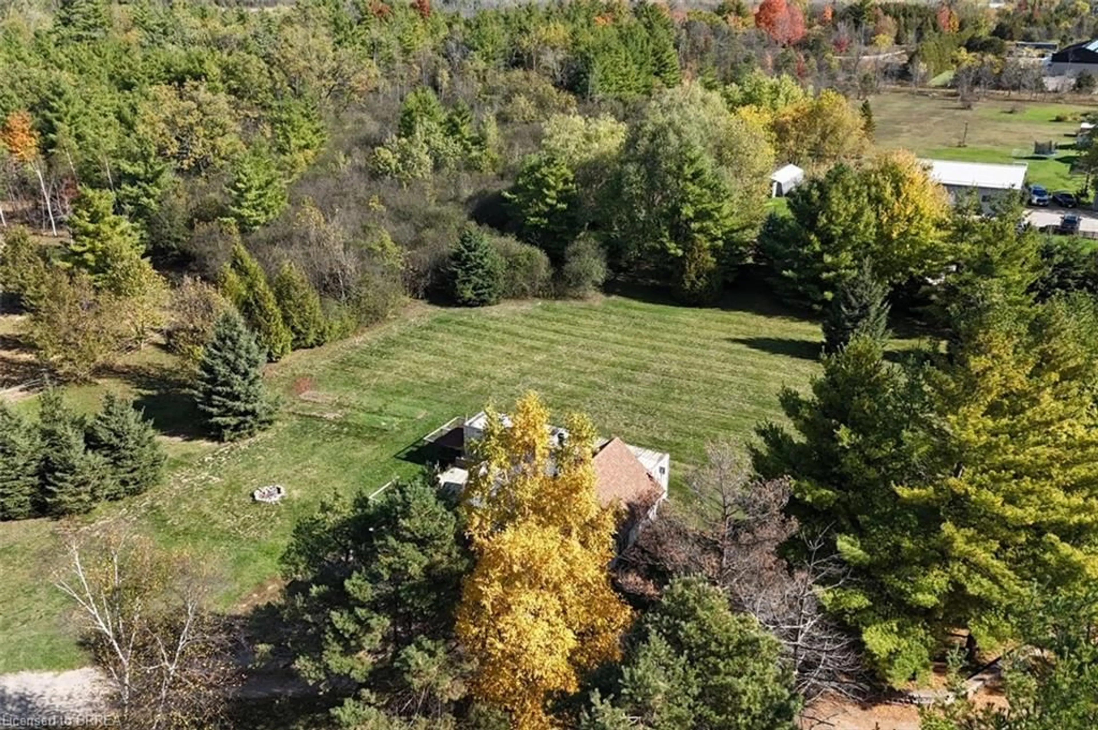 A pic from outside/outdoor area/front of a property/back of a property/a pic from drone, forest/trees view for 999 5 Conc, Flamborough Ontario L9H 5E2