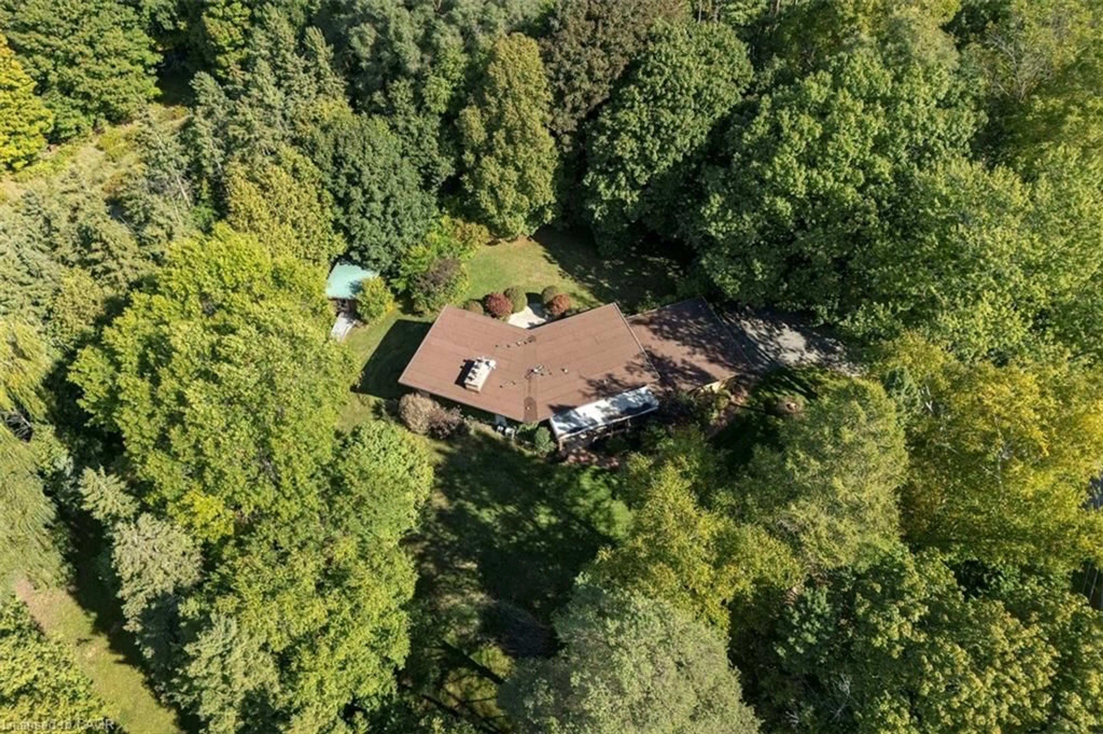 A pic from outside/outdoor area/front of a property/back of a property/a pic from drone, forest/trees view for 1441 Mineral Springs Rd, Hamilton Ontario L9H 5E3