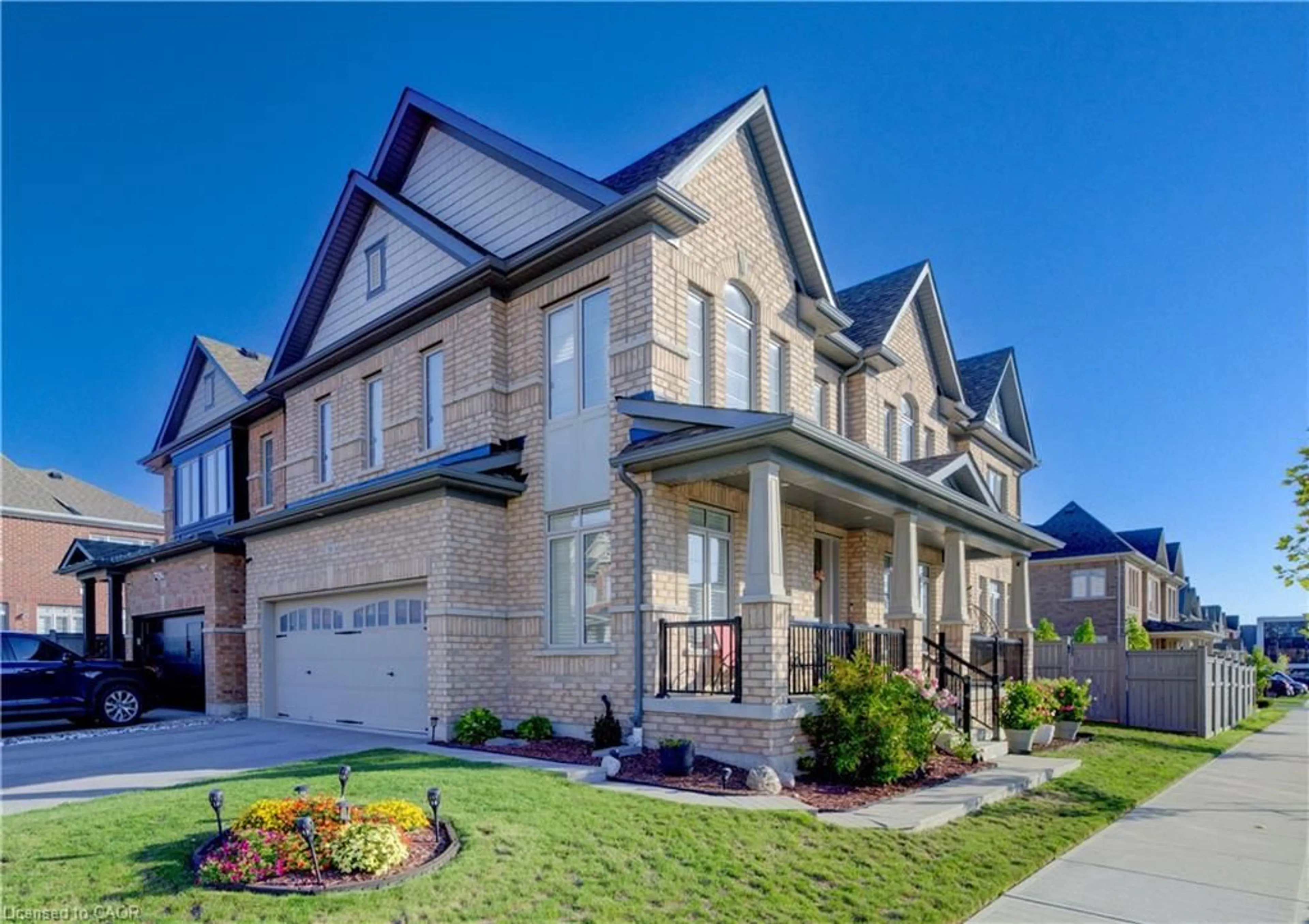 Home with brick exterior material, street for 39 Reistwood Dr, Kitchener Ontario N2R 0N8
