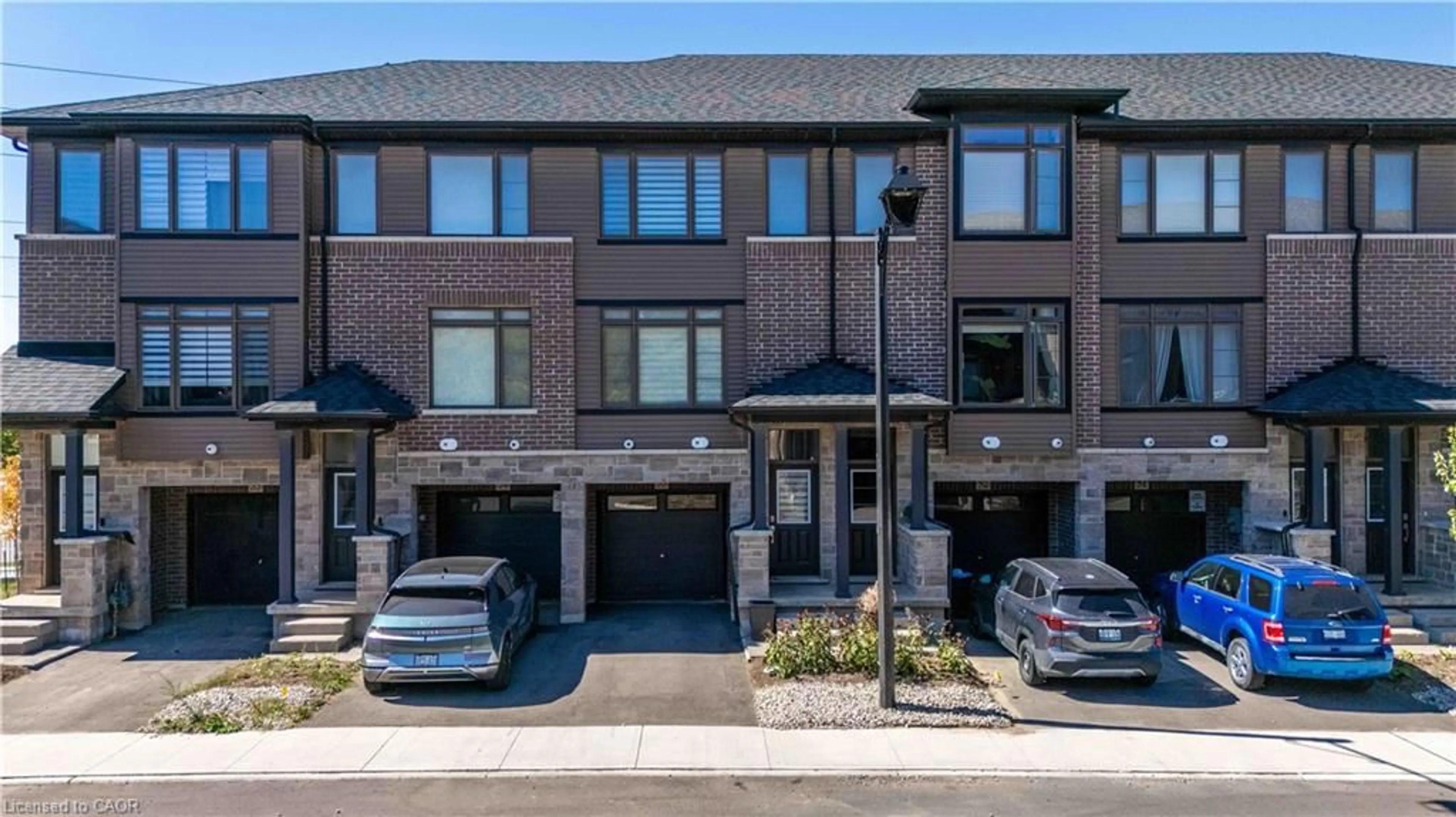 Home with brick exterior material, street for 120 Court Dr #53, Paris Ontario N3L 0N2