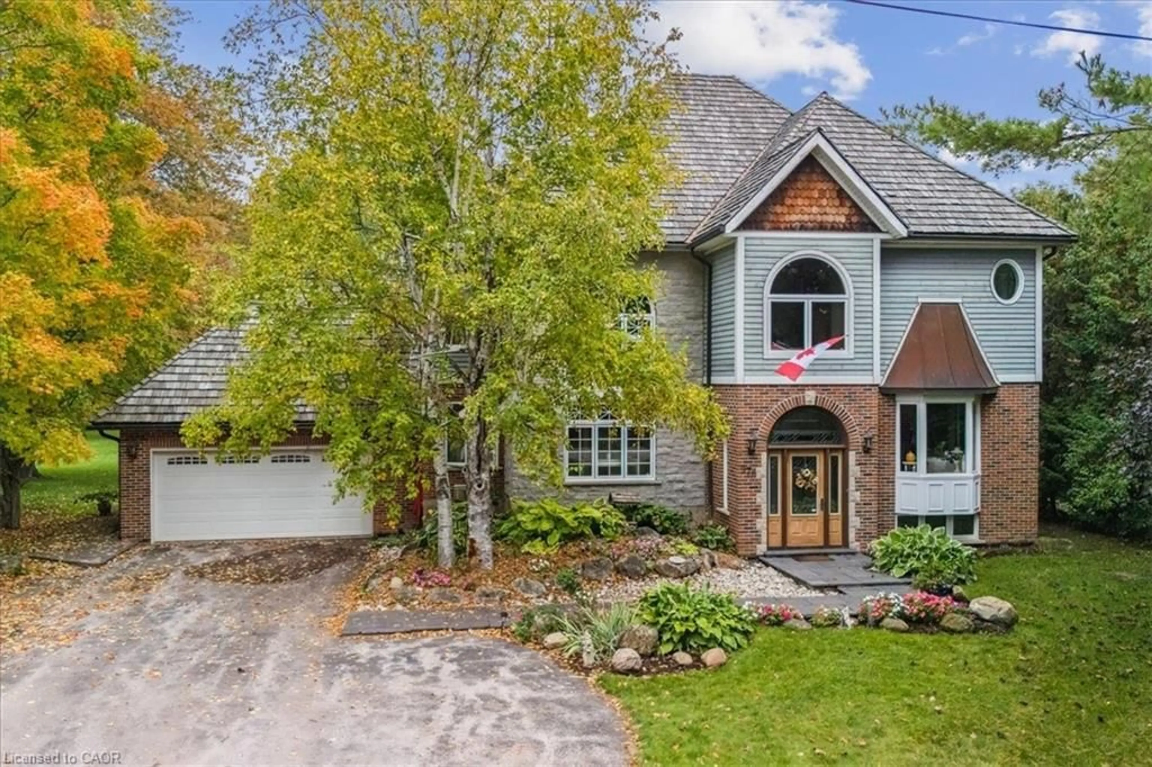 Home with brick exterior material, street for 976 Garden Lane, Hamilton Ontario L0R 1V0