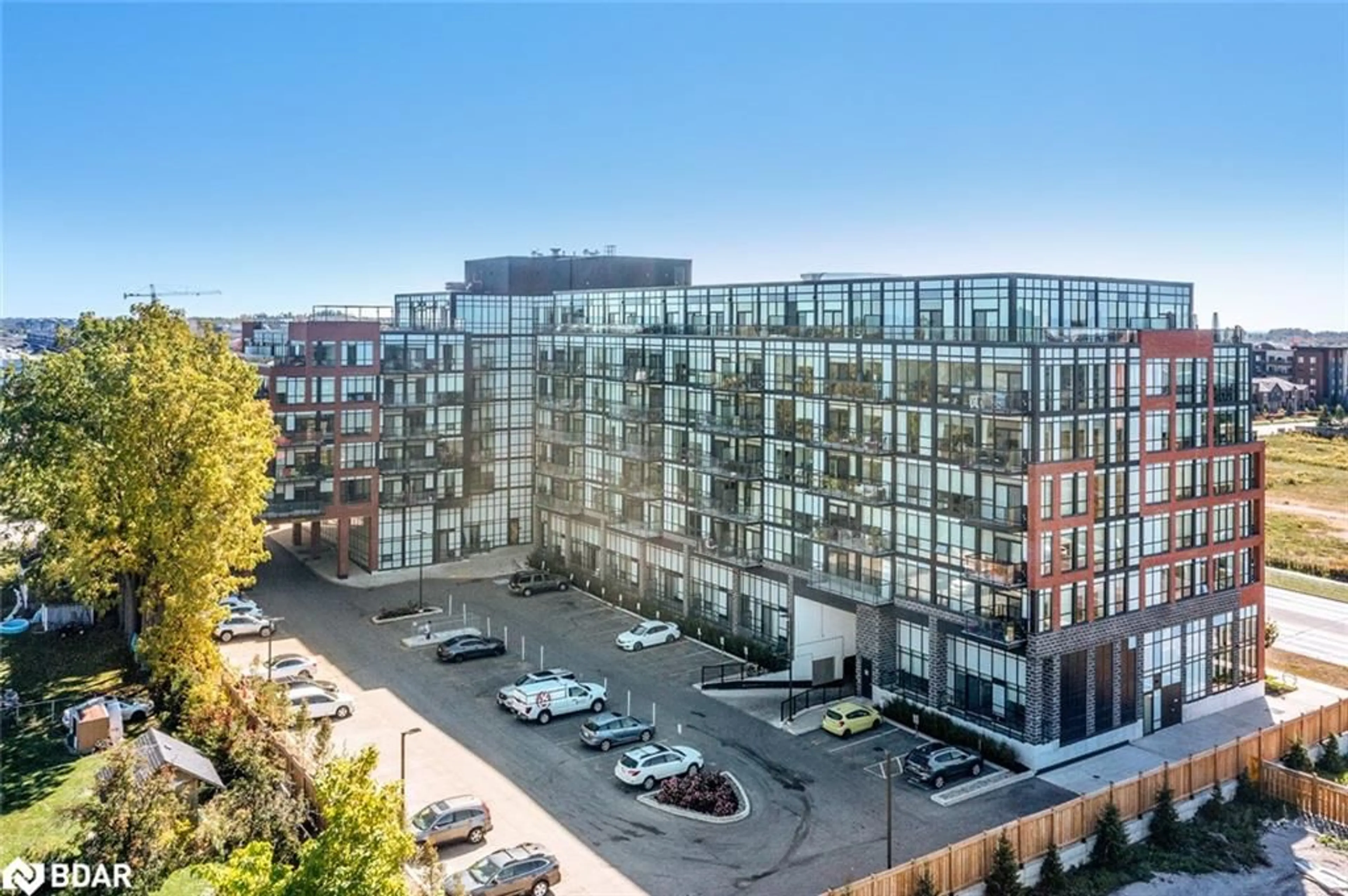 A pic from outside/outdoor area/front of a property/back of a property/a pic from drone, city buildings view from balcony for 681 Yonge St #114, Barrie Ontario L9J 0K1