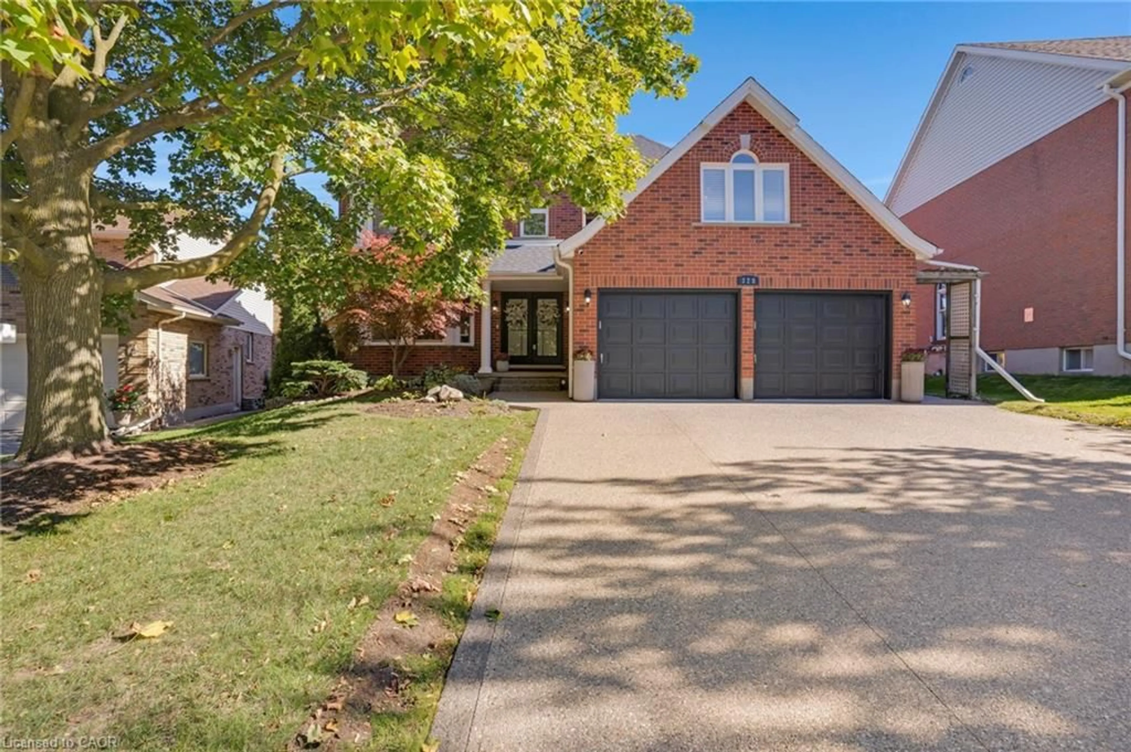 Home with brick exterior material, street for 328 Wyecroft Blvd, Waterloo Ontario N2T 2H3