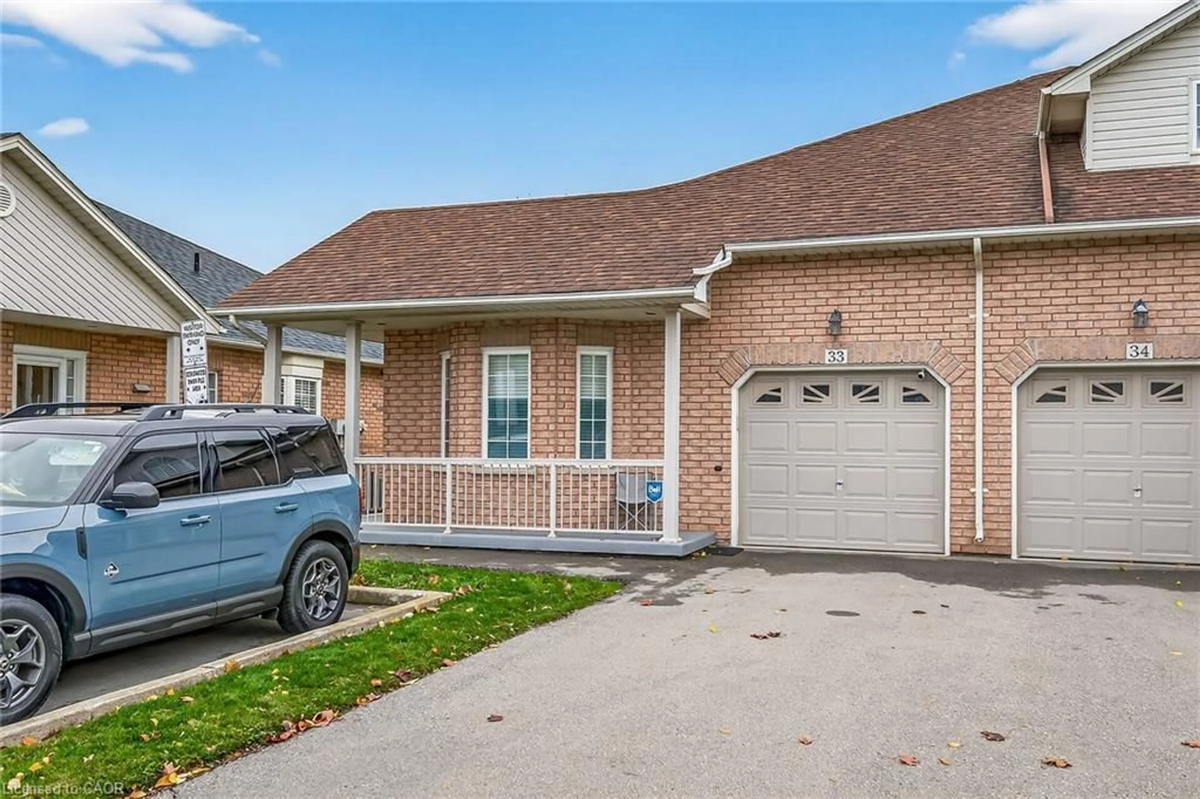 Home with brick exterior material, street for 213 Nash Rd #33, Hamilton Ontario L8K 6S2