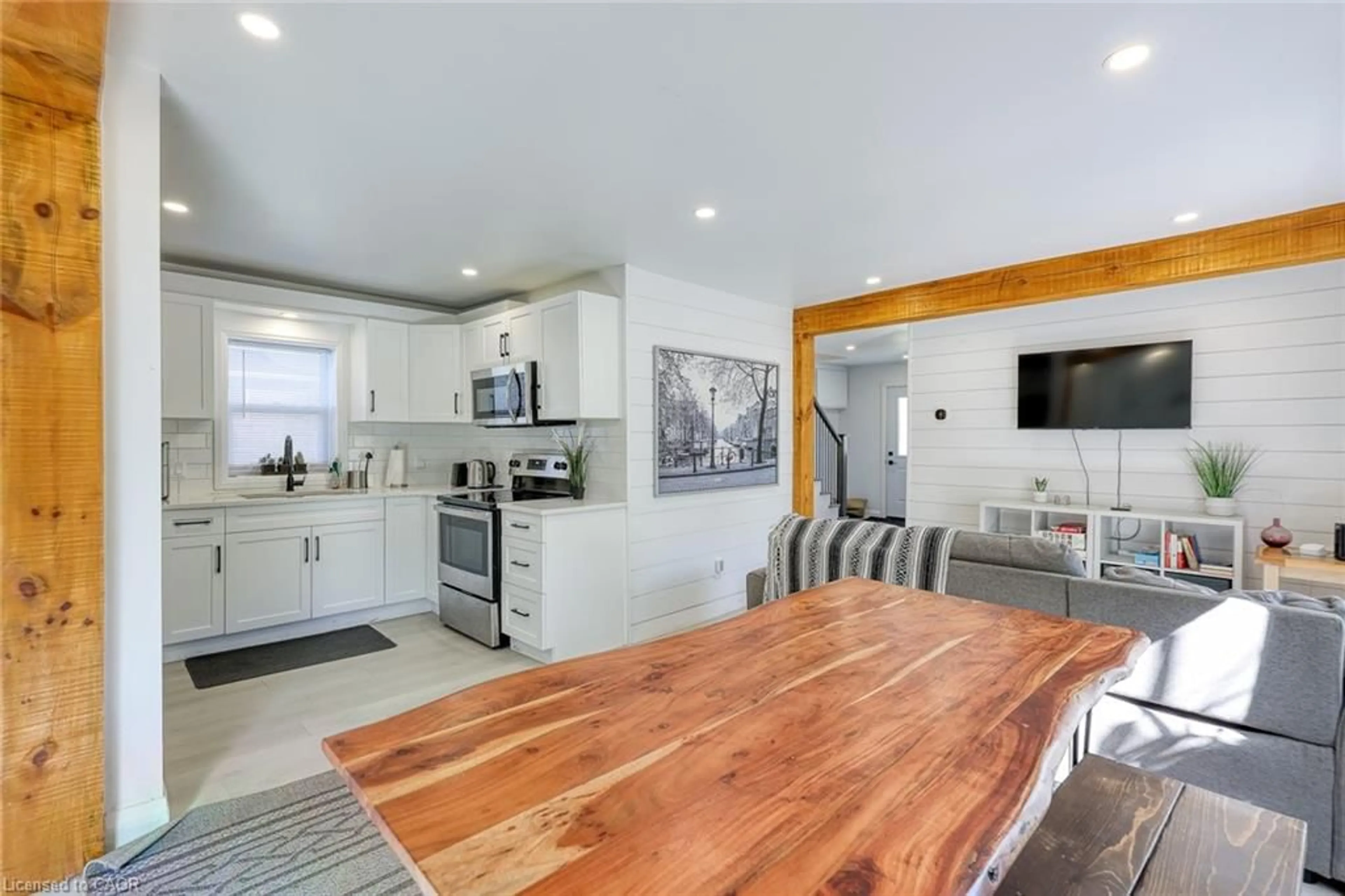 Open concept kitchen, wood/laminate floor for 51 Victoria St, Port Burwell Ontario N0J 1T0