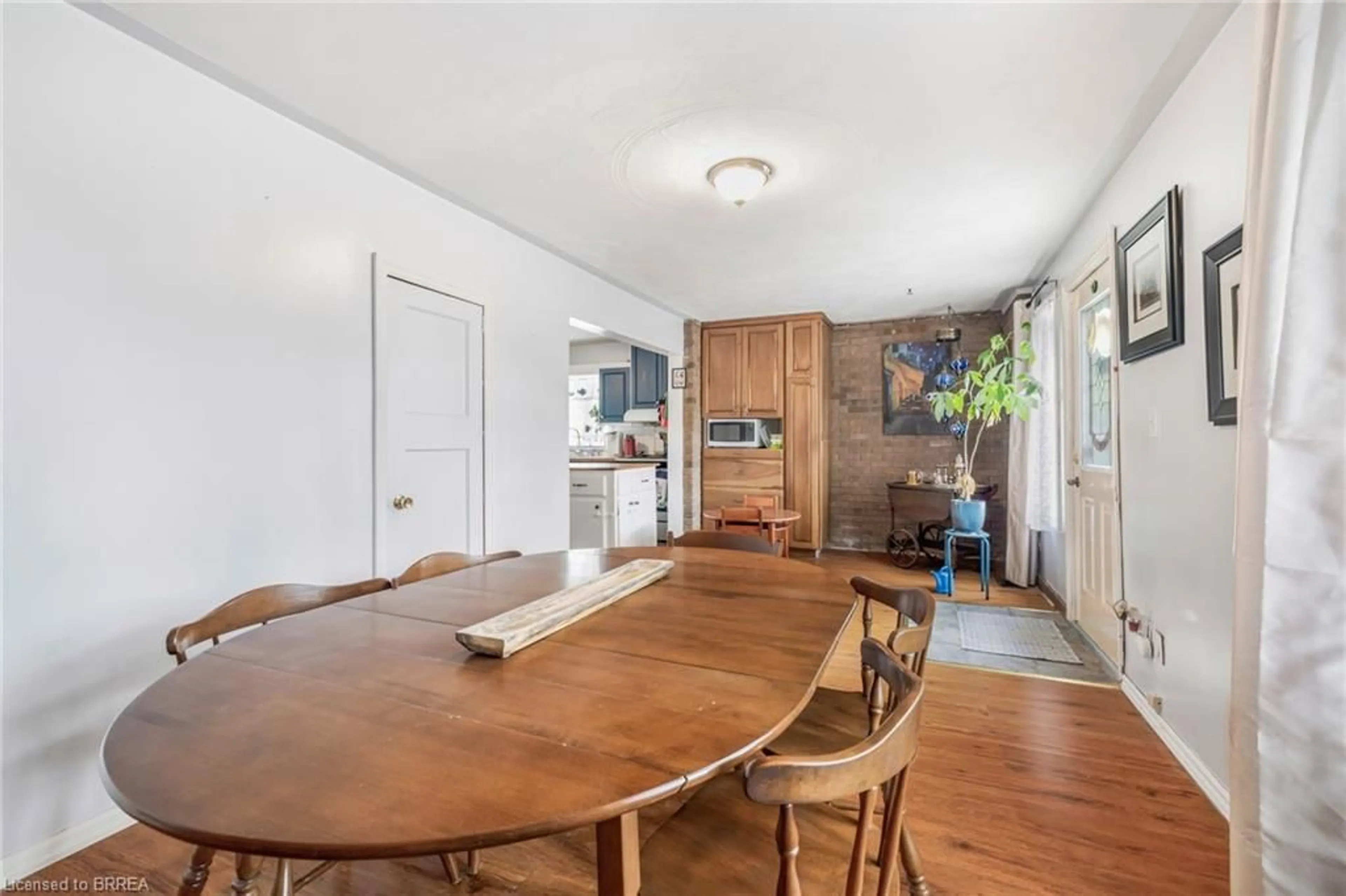 Dining room, wood/laminate floor for 161 Crysler St, Delhi Ontario N4B 1H9