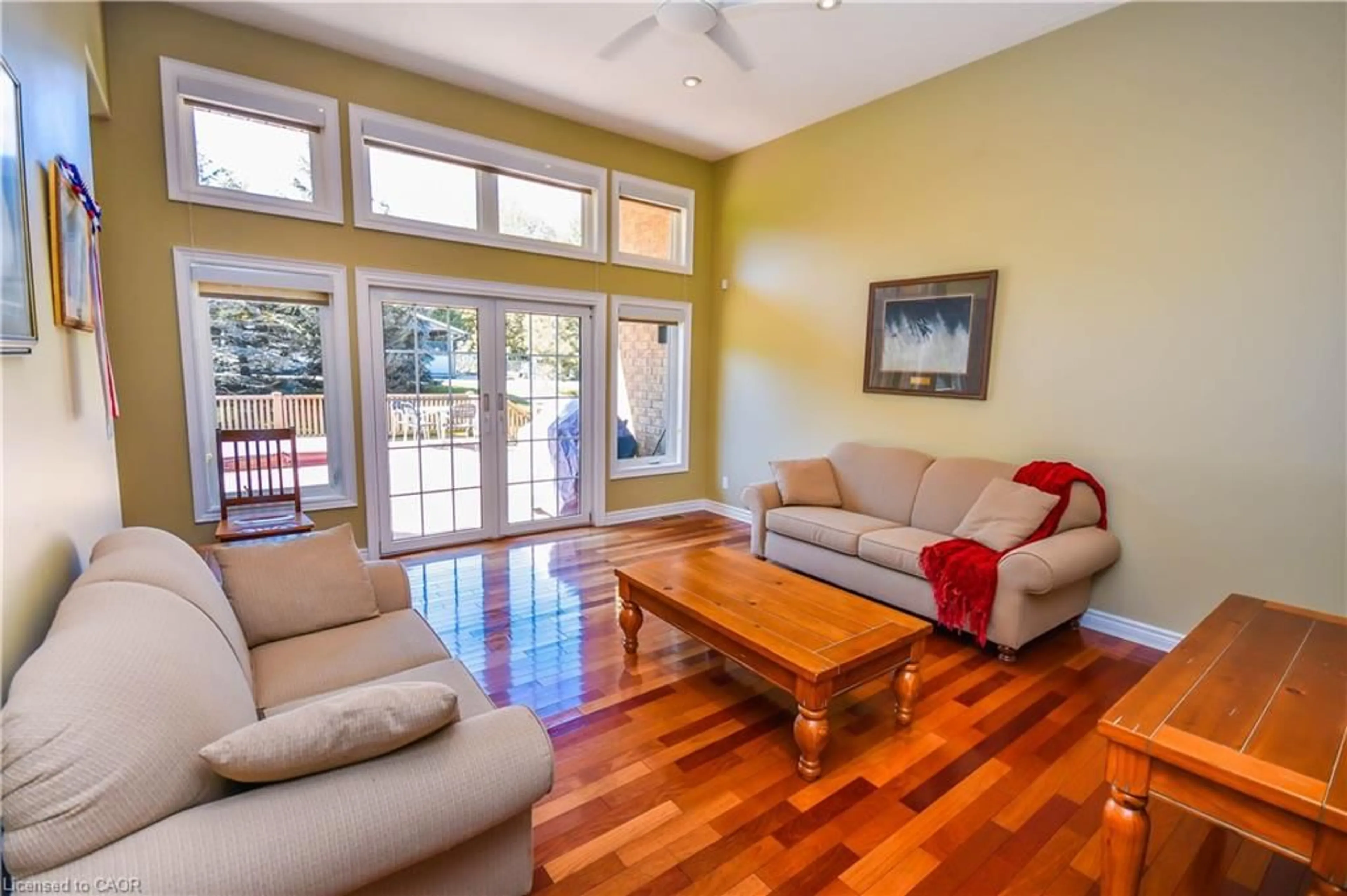 Living room with furniture, wood/laminate floor for 3040 Townline Rd, Coldwater Ontario L0K 1E0