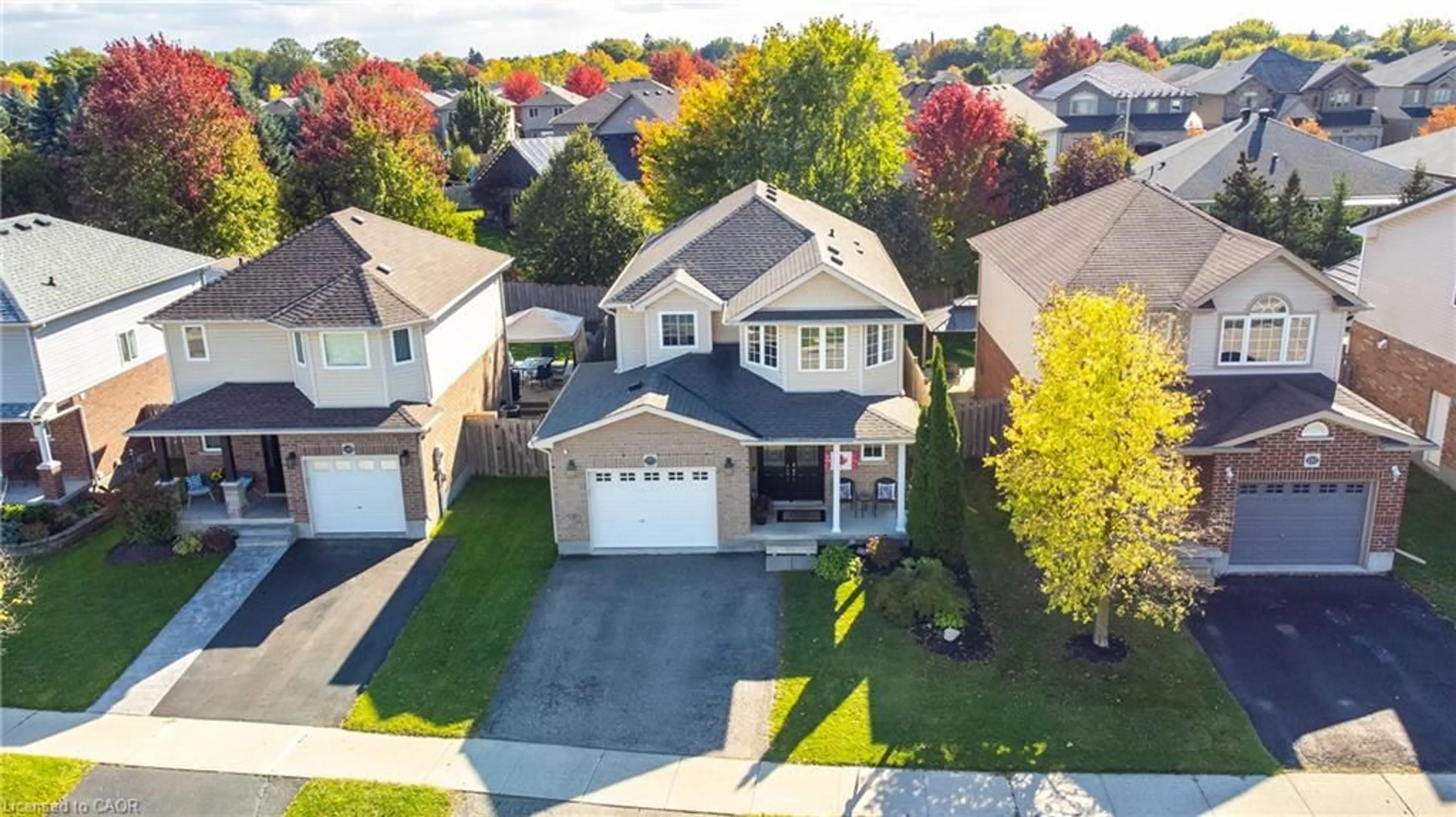 A pic from outside/outdoor area/front of a property/back of a property/a pic from drone, street for 153 Porchlight Dr, Elmira Ontario N3B 0A3