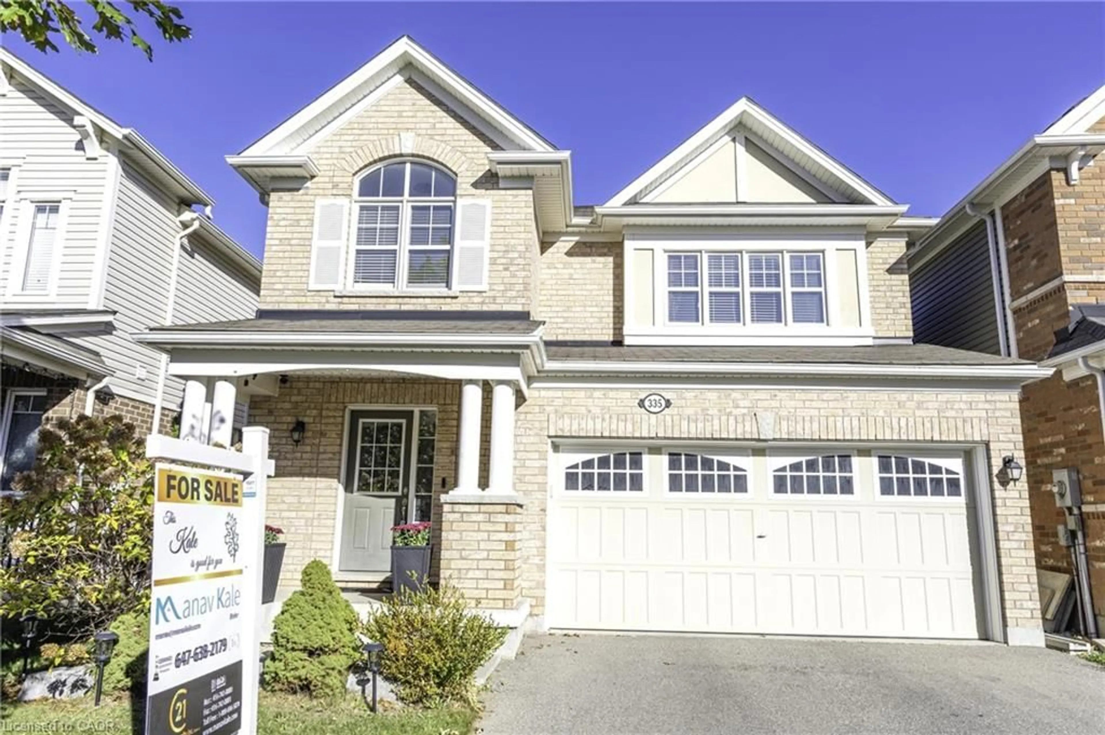 Home with brick exterior material, street for 335 Falling Green Cres, Kitchener Ontario N2R 0G4