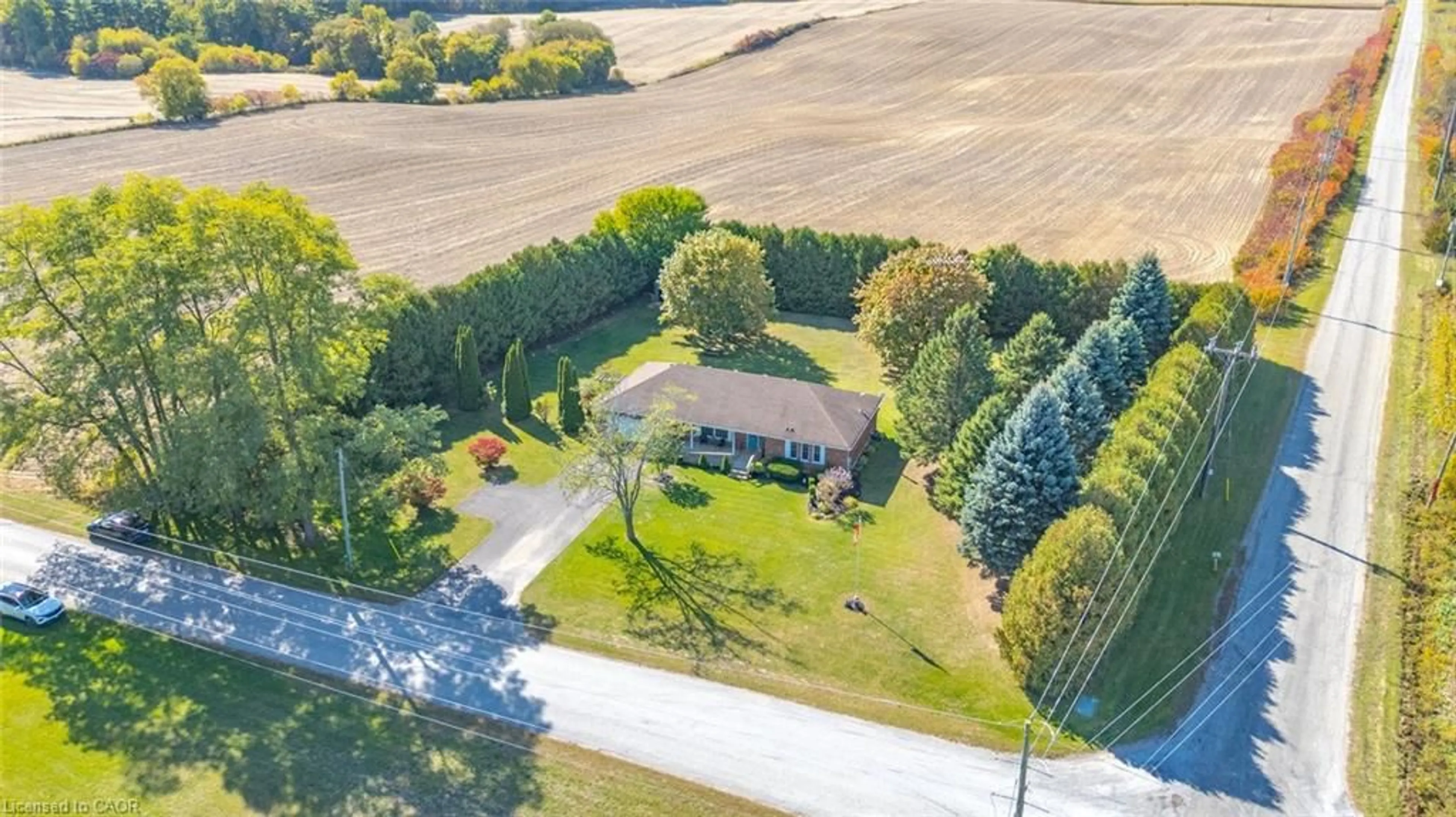 A pic from outside/outdoor area/front of a property/back of a property/a pic from drone, unknown for 497 Water St, Vittoria Ontario N3Y 4K1