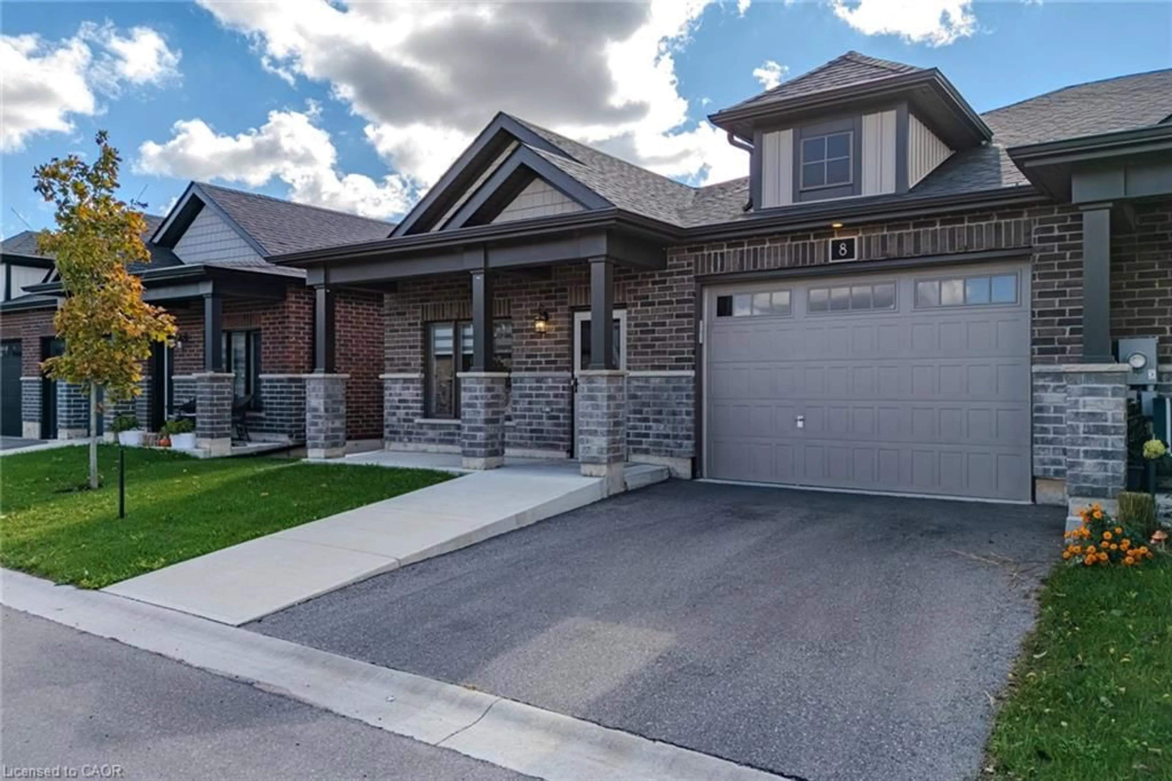 Home with brick exterior material, street for 8 Waterthrush Lane, Simcoe Ontario N3Y 0E9