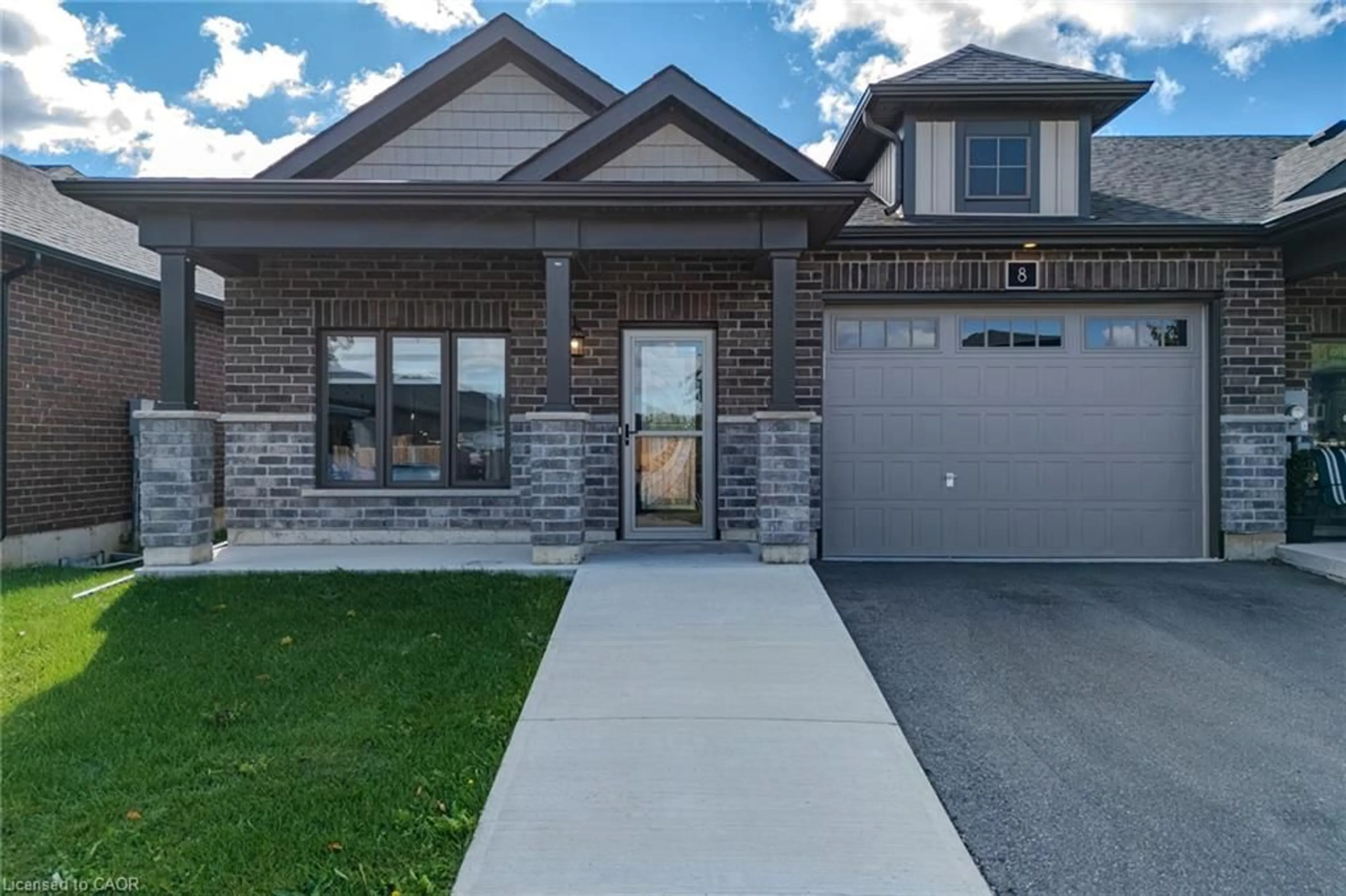 Home with brick exterior material, street for 8 Waterthrush Lane, Simcoe Ontario N3Y 0E9