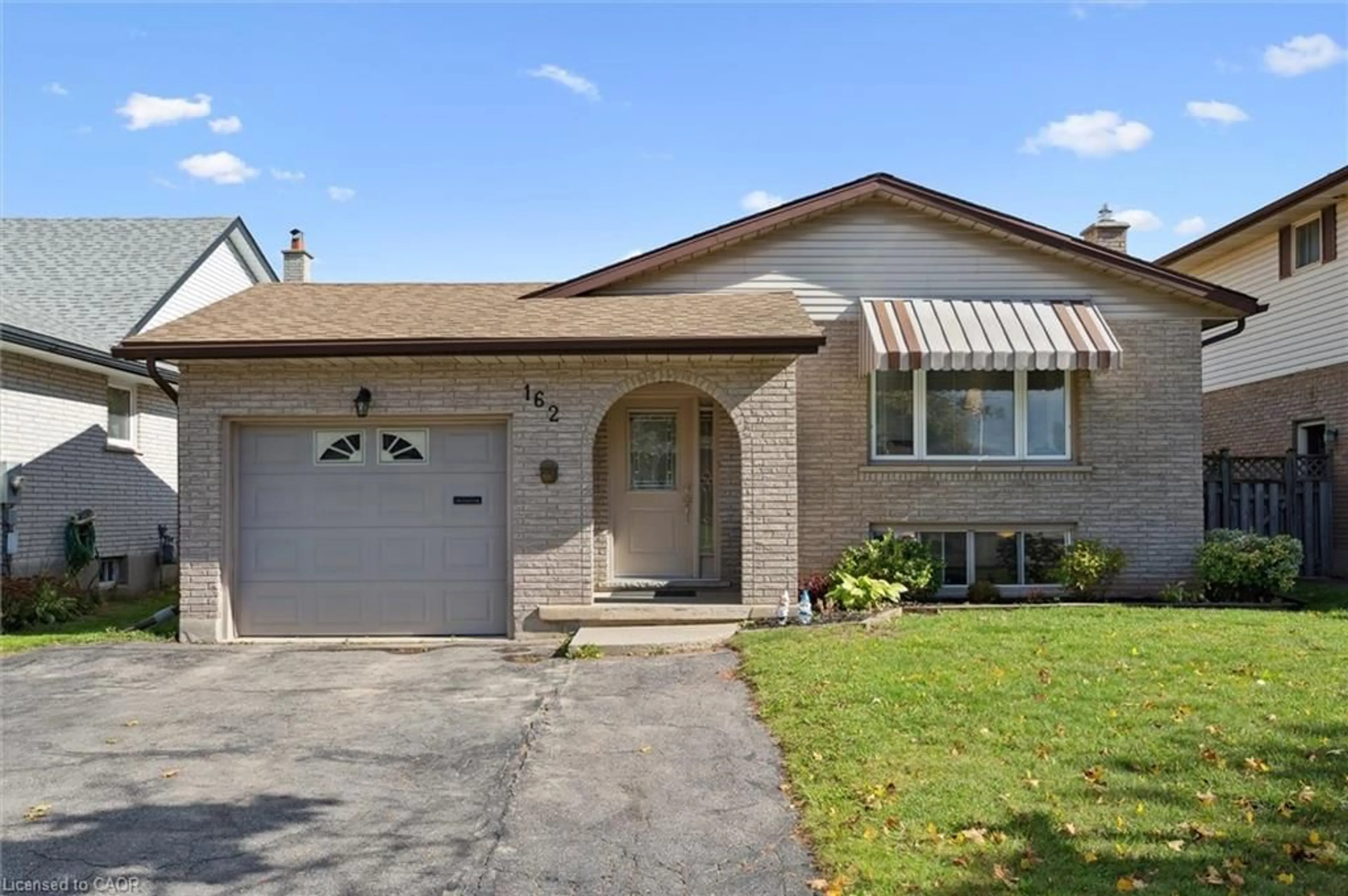 Home with brick exterior material, street for 162 The Country Way, Kitchener Ontario N2E 2L2