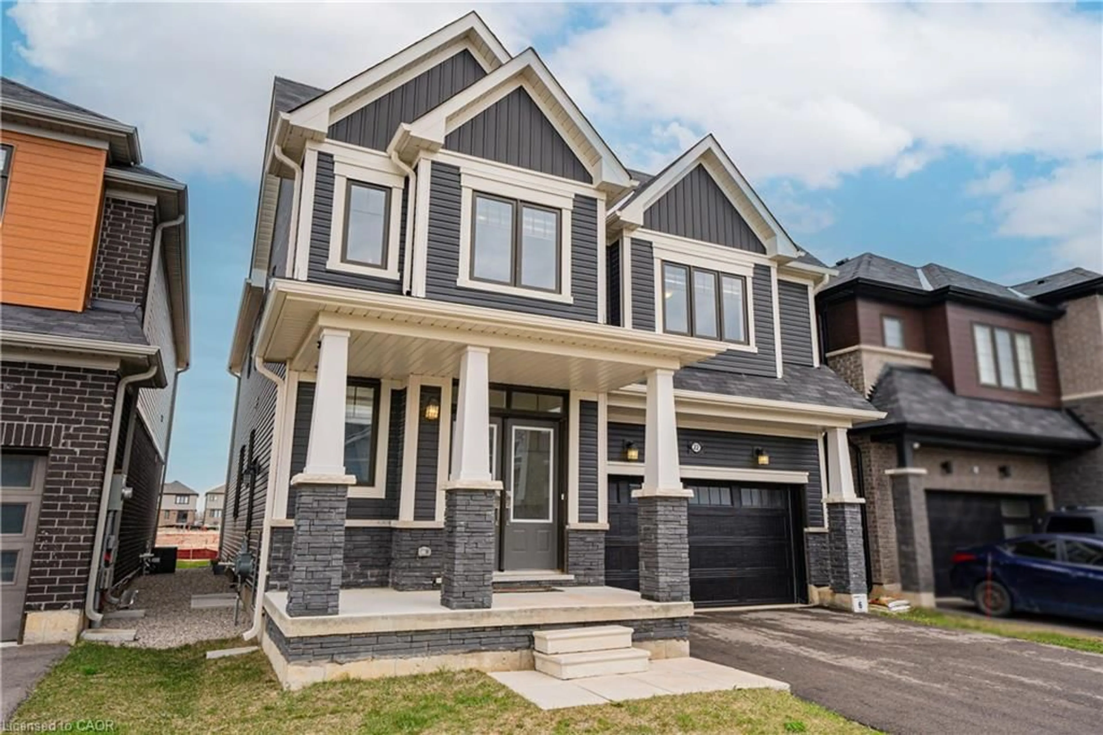 Home with brick exterior material, street for 22 Oaktree Dr, Caledonia Ontario N3W 0E6