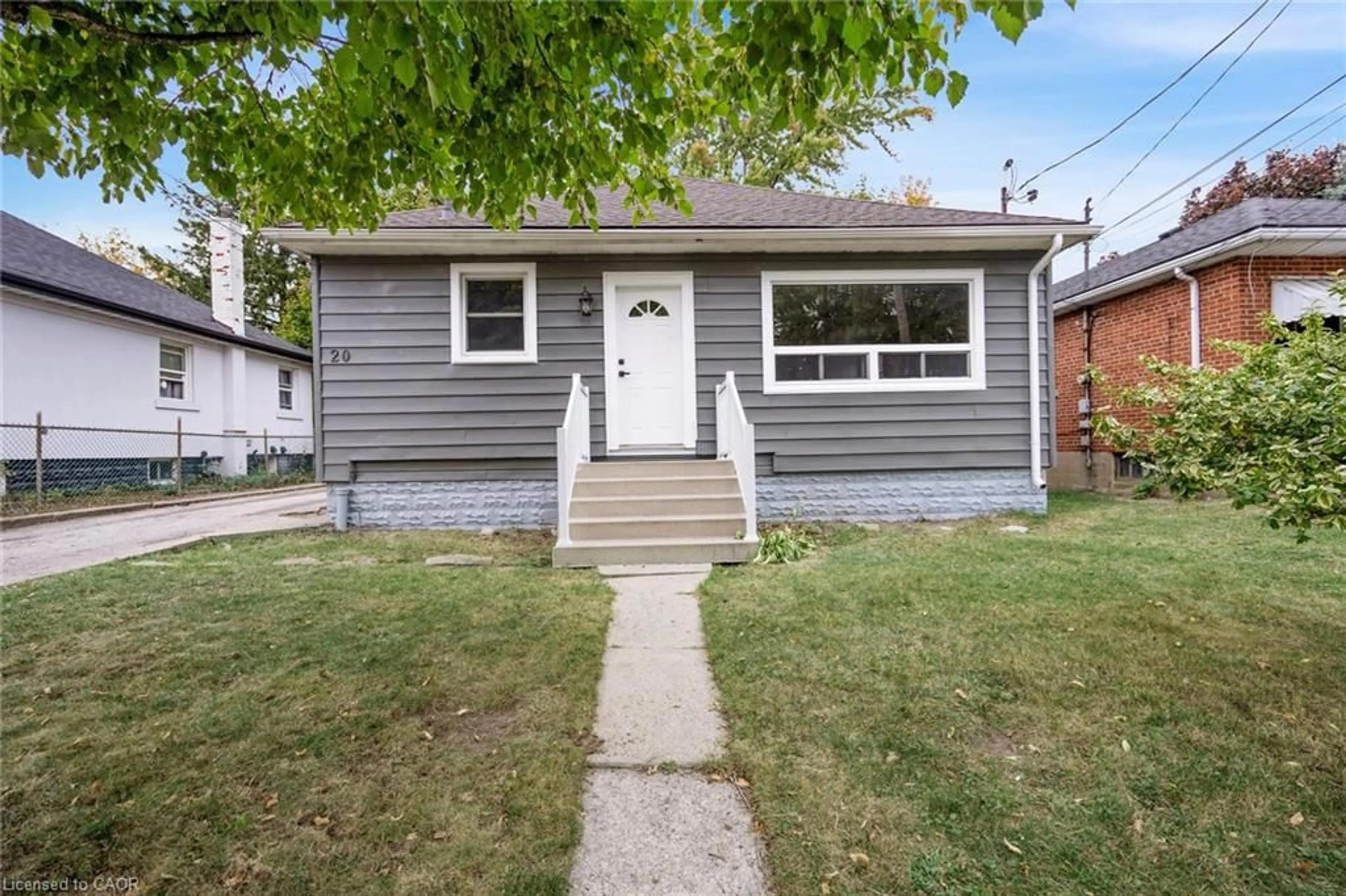 Home with vinyl exterior material, street for 20 West 4th St, Hamilton Ontario L9C 3M3