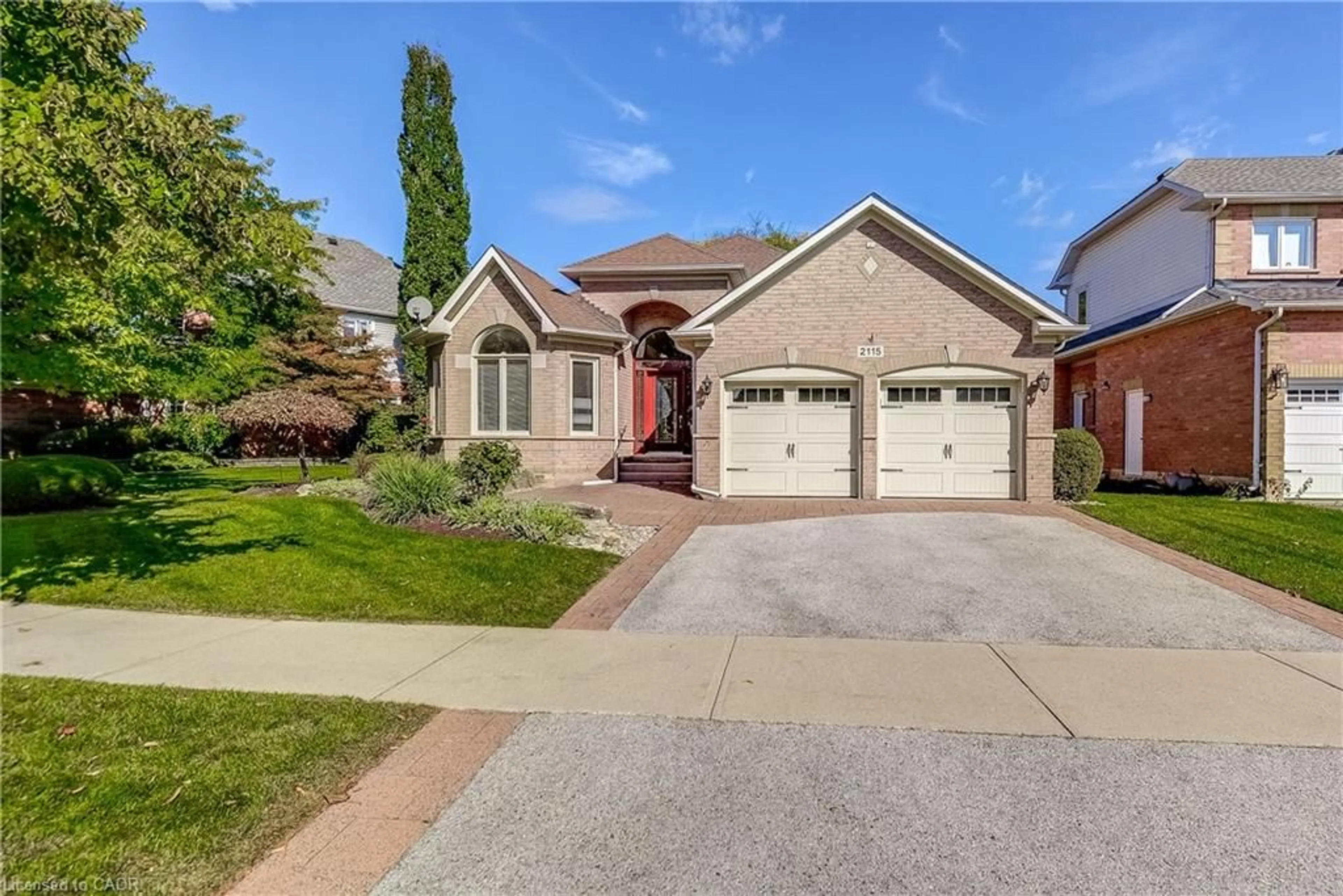 Home with brick exterior material, street for 2115 Turnberry Rd, Burlington Ontario L7M 4J4